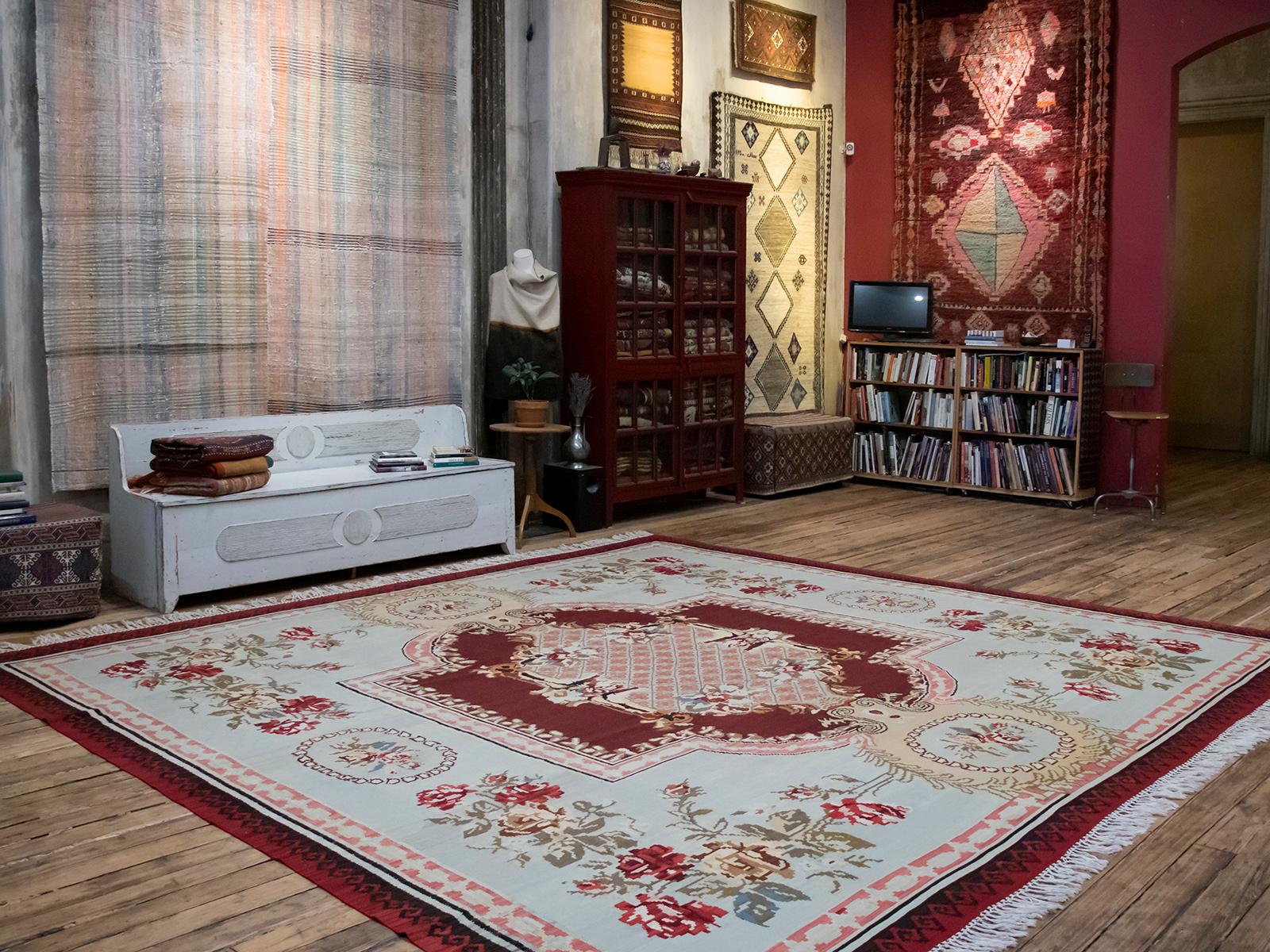 The elegance of a bygone era - an old kilim from Southeast Europe with a refined design and color palette that is seldom encountered among the many weavings of this prolific region.