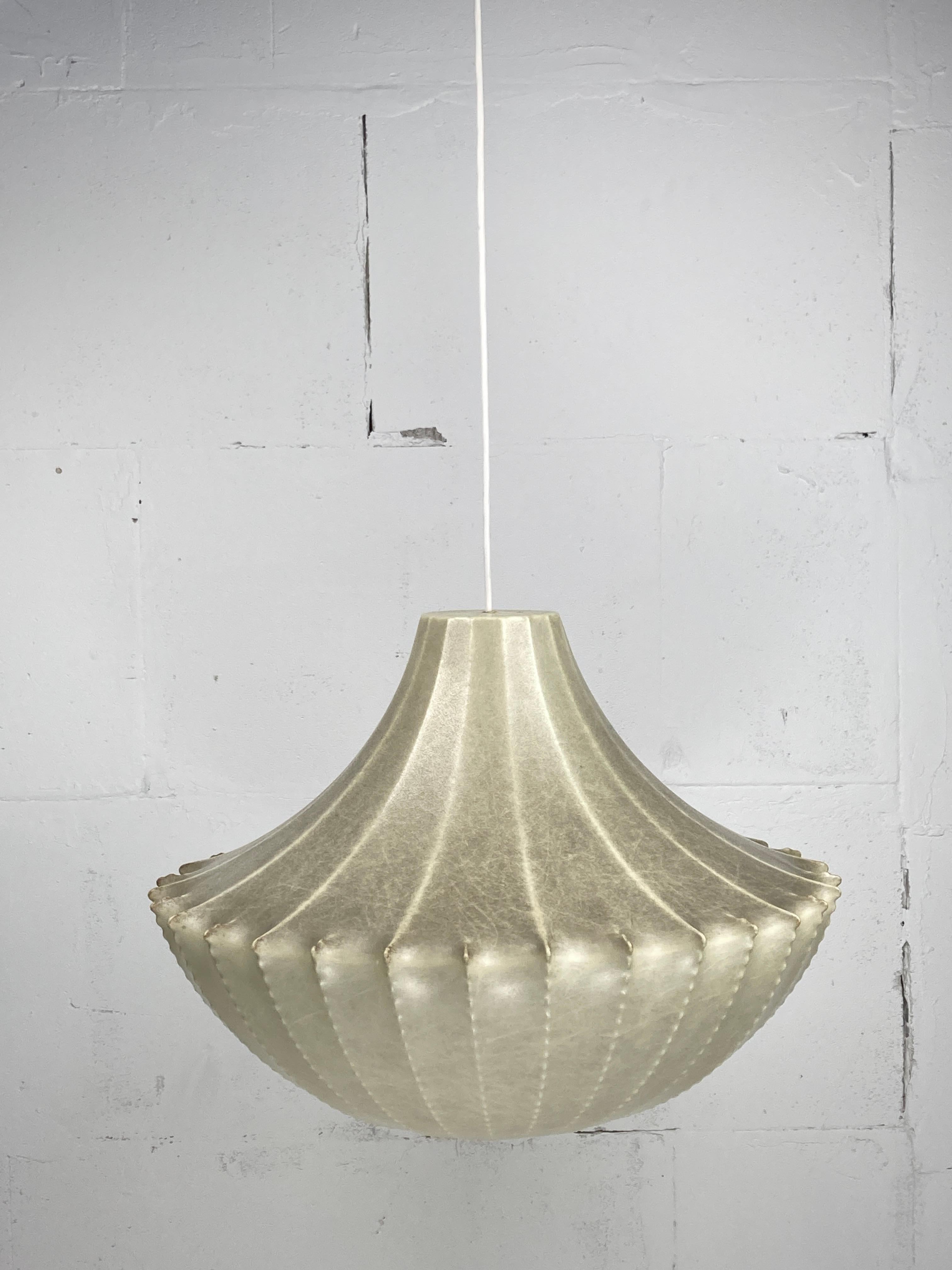 A large ( height 60 cm diameter 45 cm ) cocoon pendant from Germany 1960s. Generally these are attributed to Goldkant and often referred to as in the style of the cocoon pendants by Friedel Wauer and Achille Castiglioni for Flos. The stretched resin