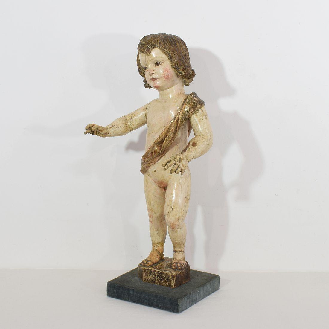 Fabulous large baroque baby Jesus with original color. Spain, circa 1700-1750. Weathered, small losses and old repairs.
Measurement includes the base of later date. More pictures available on request.