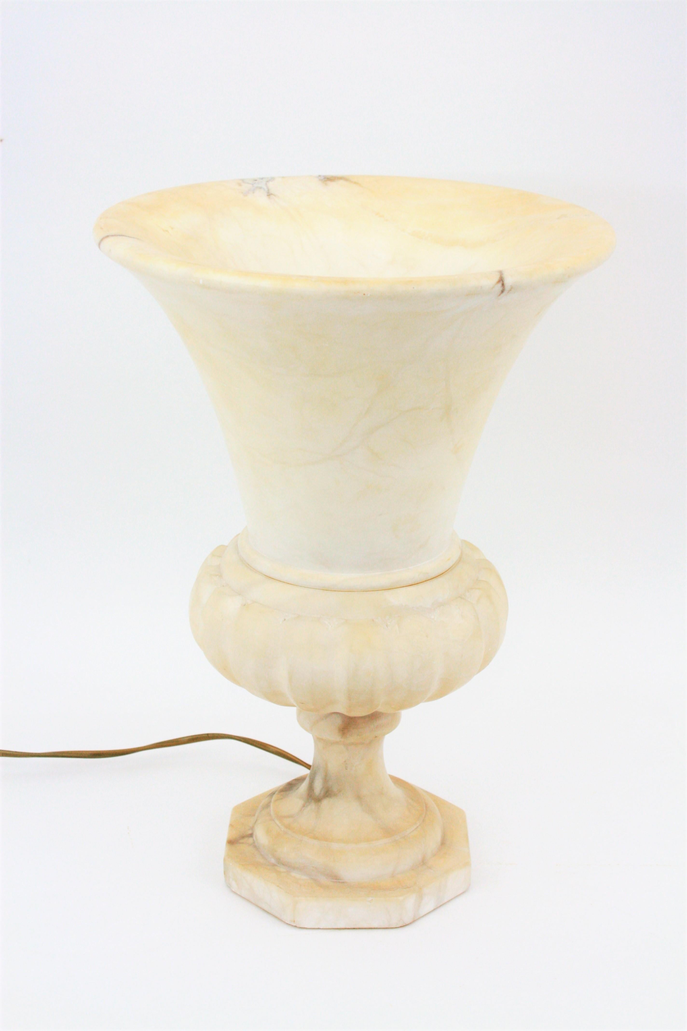Sculptural alabaster Art Deco period urn lamp with neoclassical design
Magnificent color and excellent vintage patina. Impressive appearance when it is lit. Spain, 1930s.



 