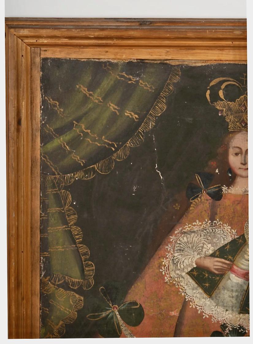 This is a large Spanish Colonial, Cuzco School (Cuzqueno) painting the Archangel Michael. The painting appears to have little or no restorations and, as such, is in remarkable condition. We have chosen to leave that painting as found as the patina