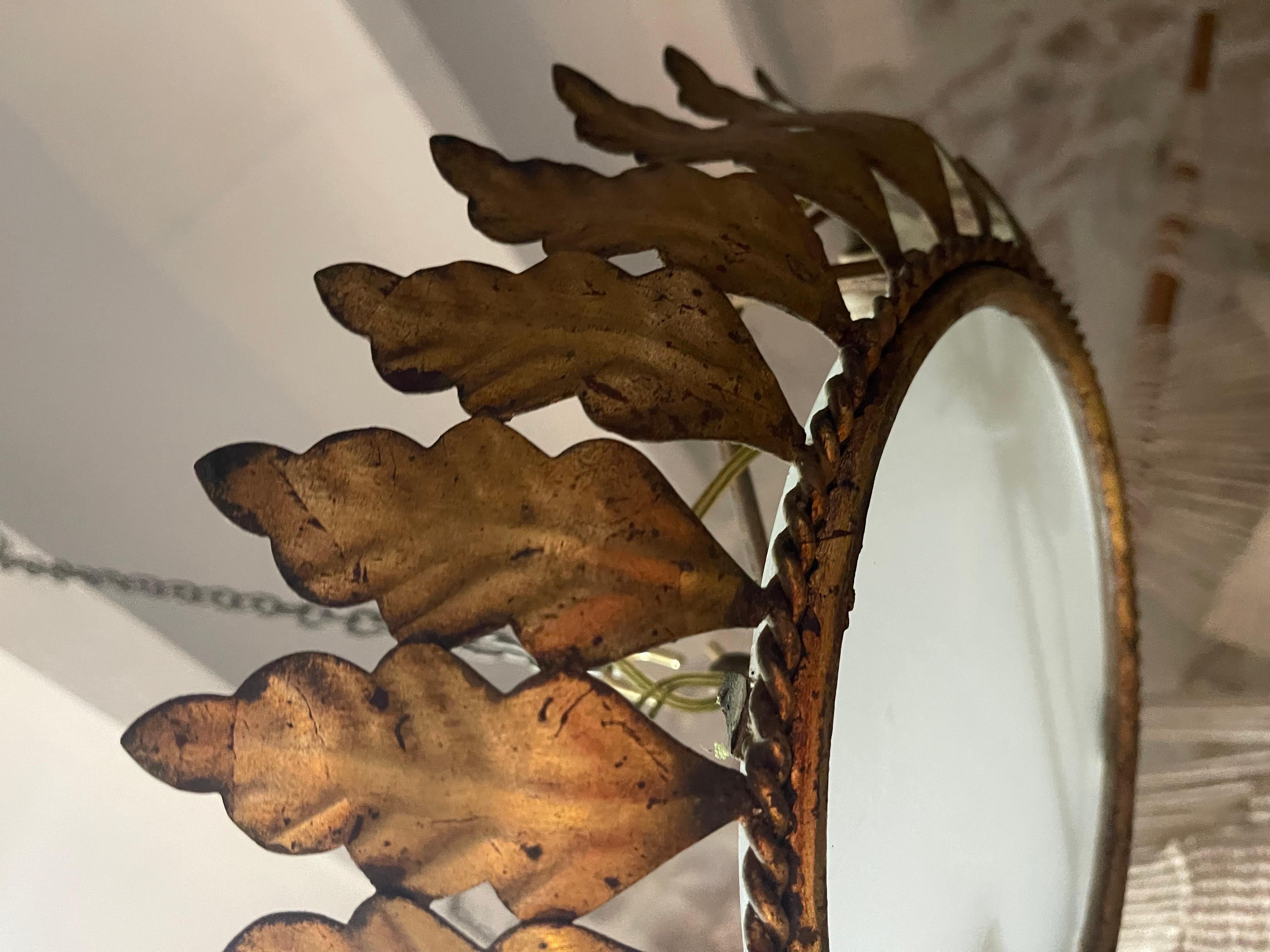 Hammered Large Spanish Crown Sunburst fixture in Gilt Metal and frost Glass , circa 1950 For Sale