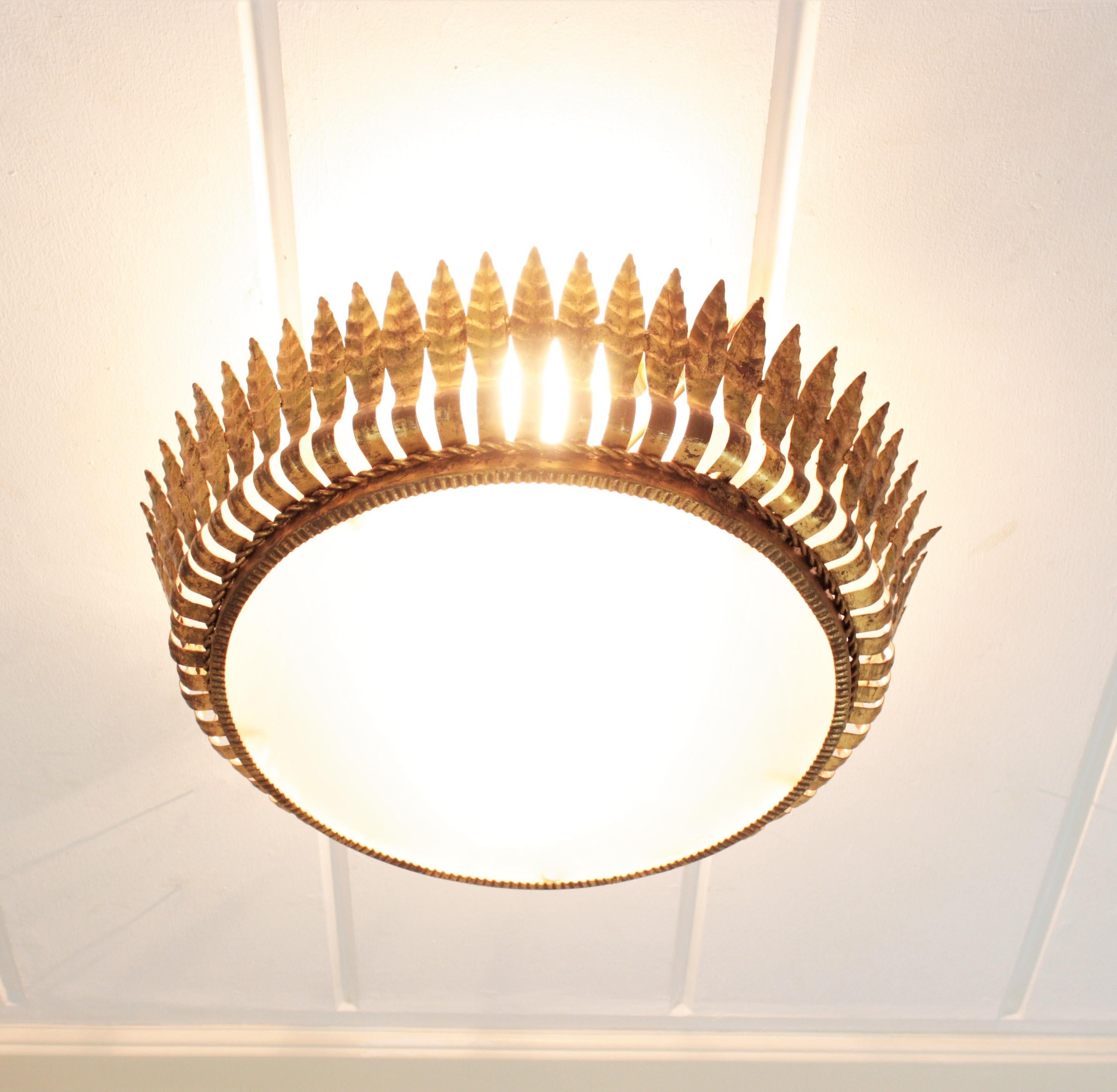 Mid-Century Modern Large Spanish Crown Sunburst Leafed Light Fixture in Gilt Metal & Frosted Glass For Sale