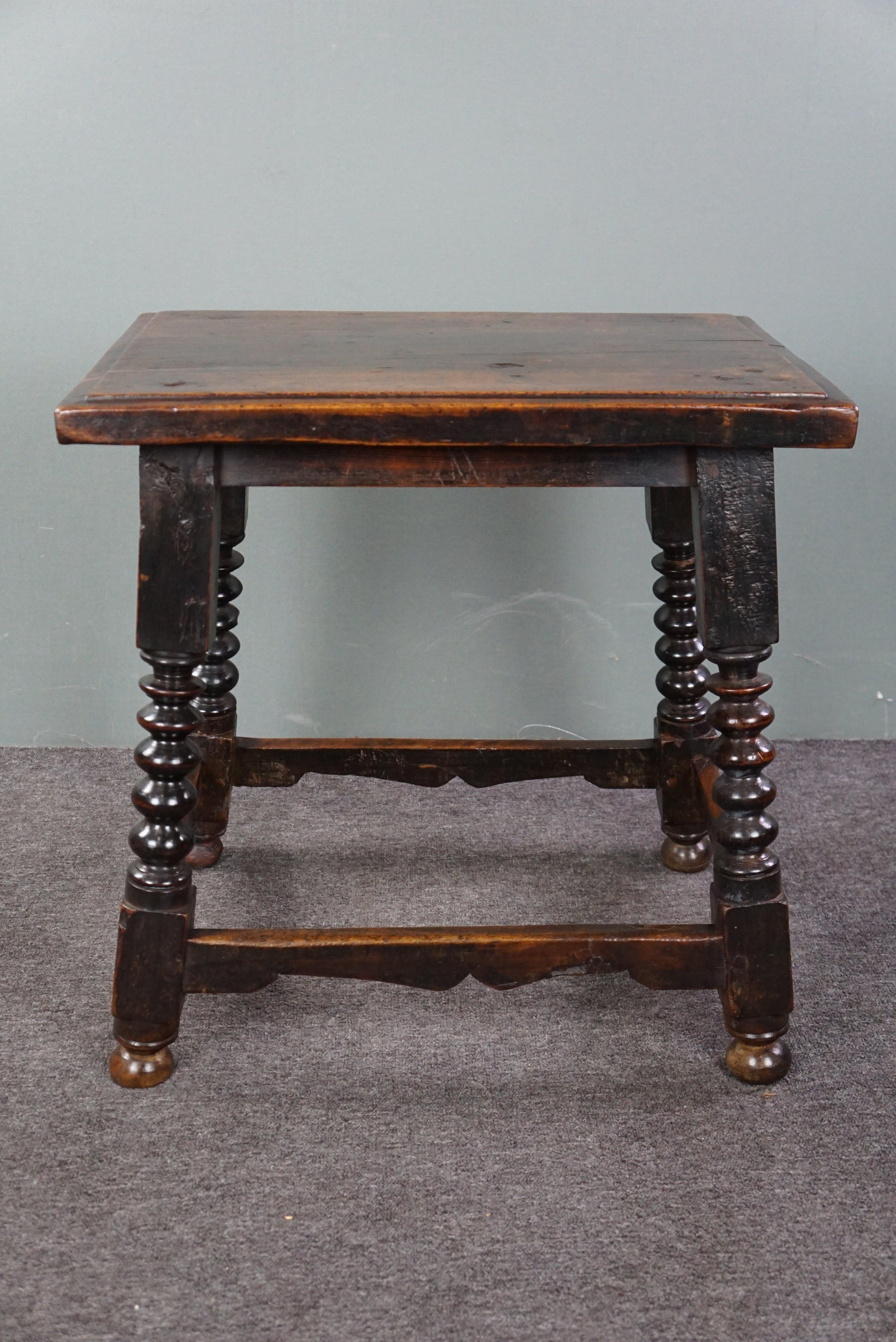 Offered is this beautiful and in very good condition, large Spanish joint stool from the 16th century with stunning twisted legs. This remarkable 16th-century gem has an impressively commanding presence; one cannot help but admire not only its age