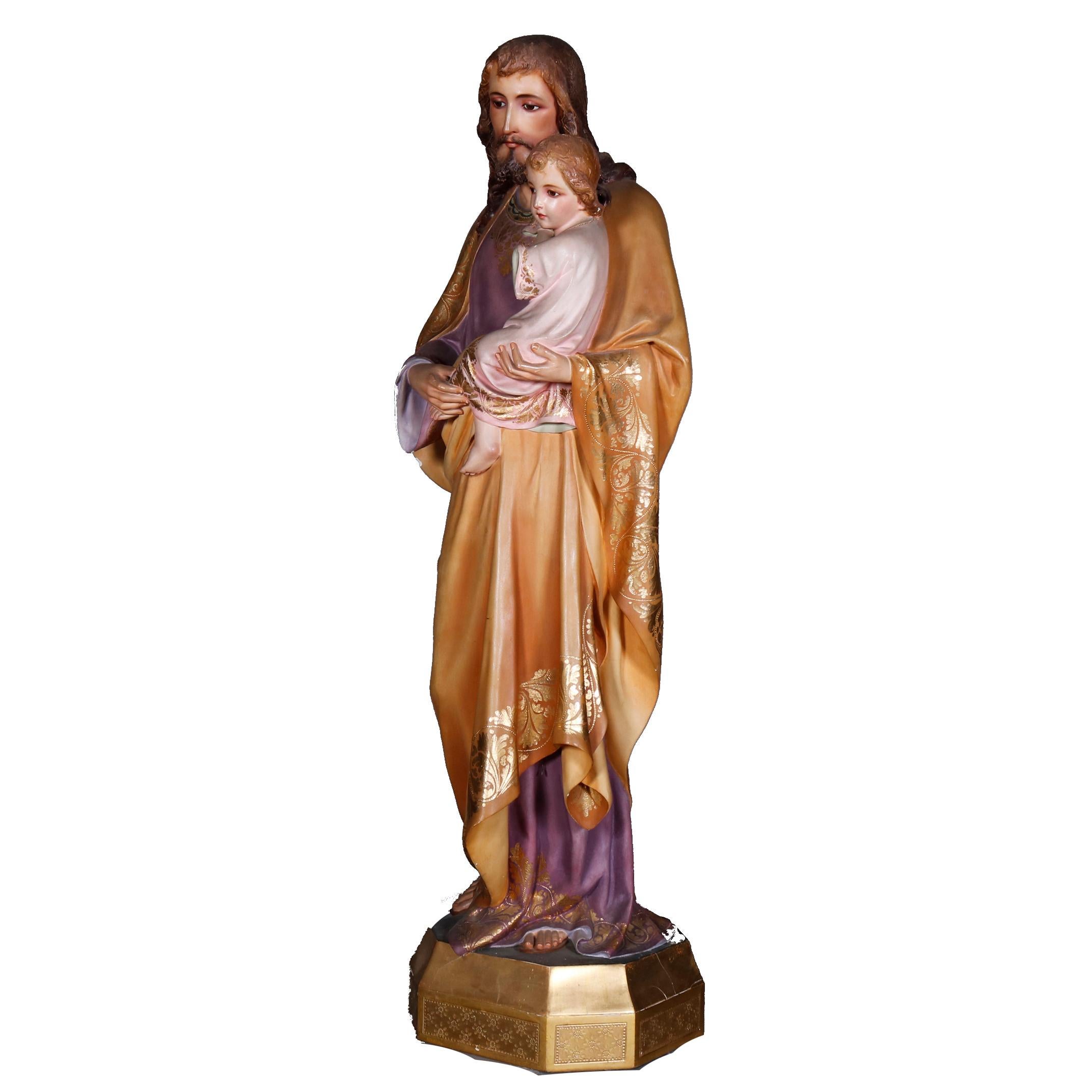 An antique and large full figure hollow cast plaster sculptural statue by Castellan's Workshop offers hand painted and gilt Christian figure of Joseph and The Christ Child, title block reads 