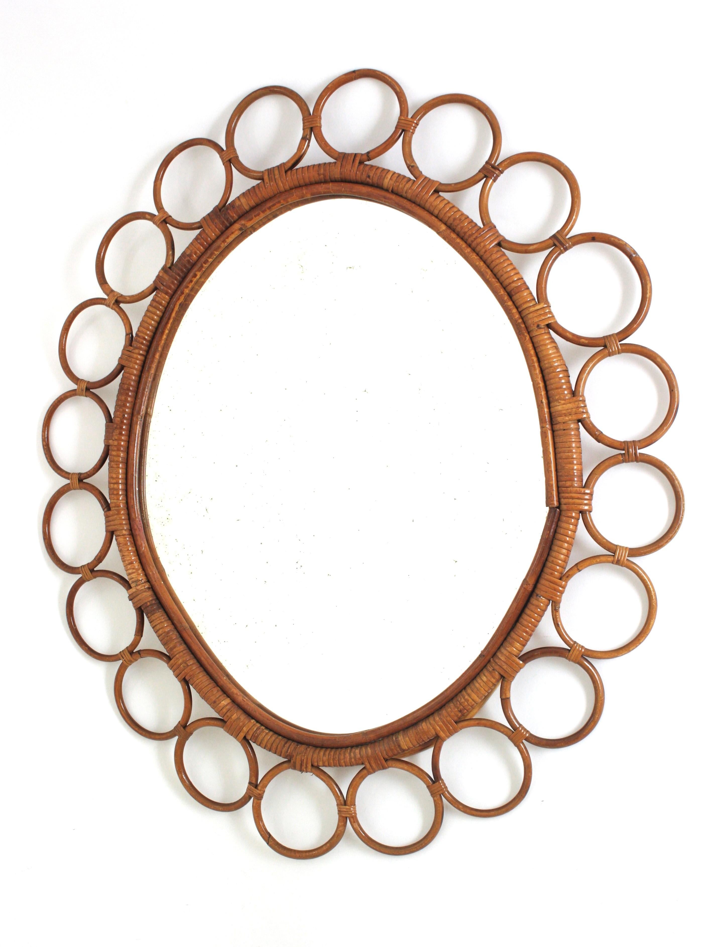 Grande specchio ovale in rattan spagnolo con cornice ad anelli in vendita 2
