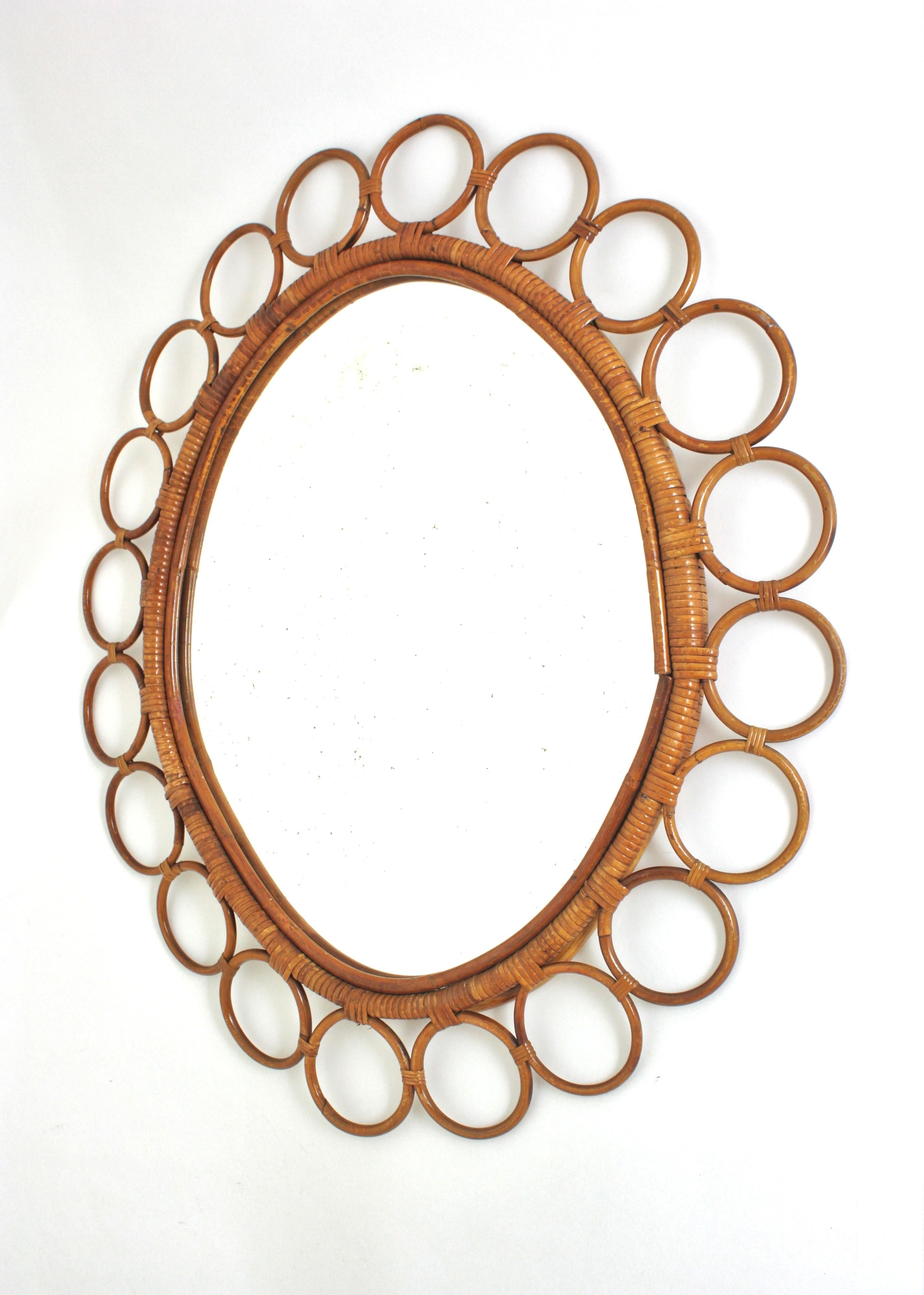 Grande specchio ovale in rattan spagnolo con cornice ad anelli in vendita 3