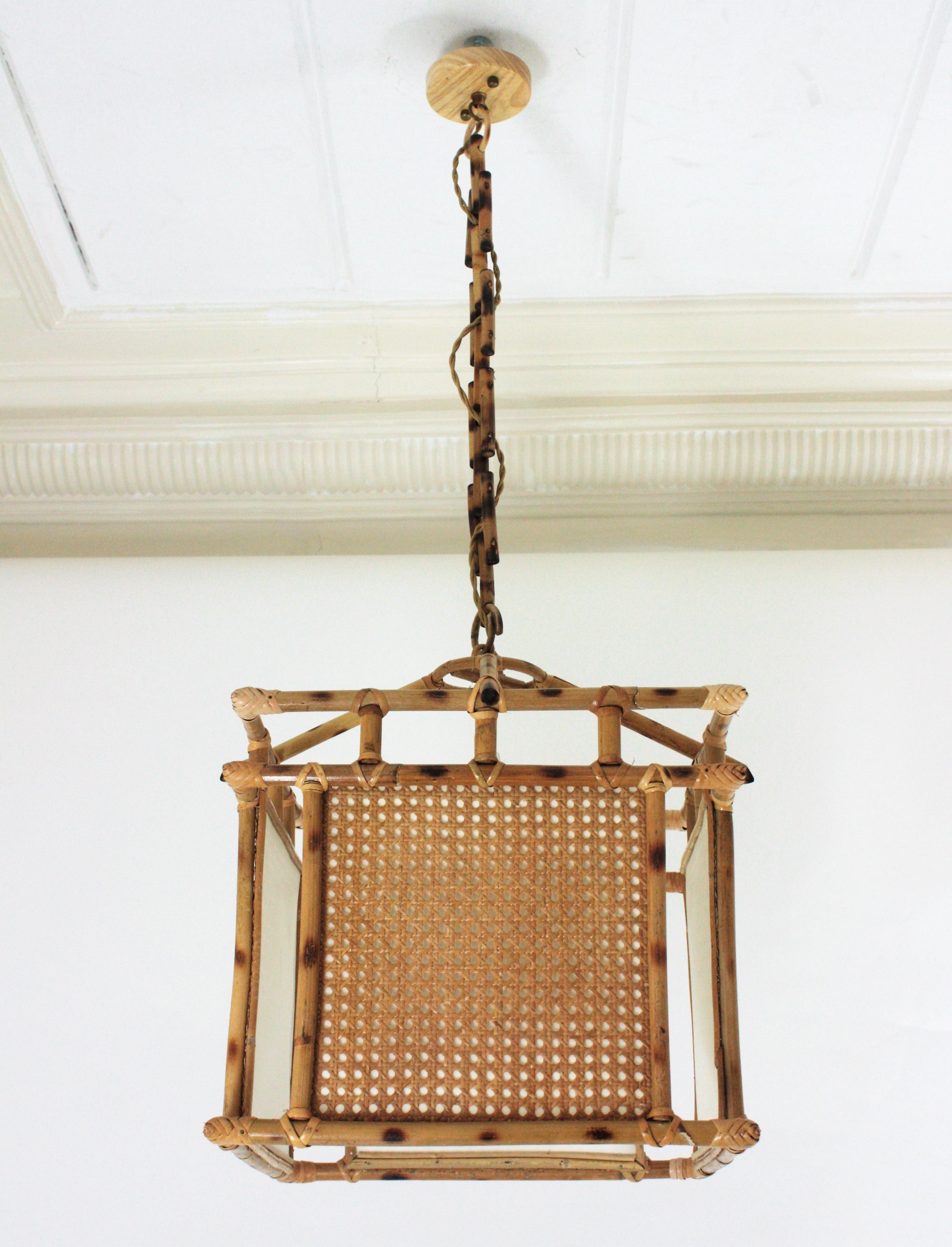 Hand-Crafted Large Spanish Rattan Wicker Wire Pendant Lantern Chinoiserie Inspired, 1960s For Sale