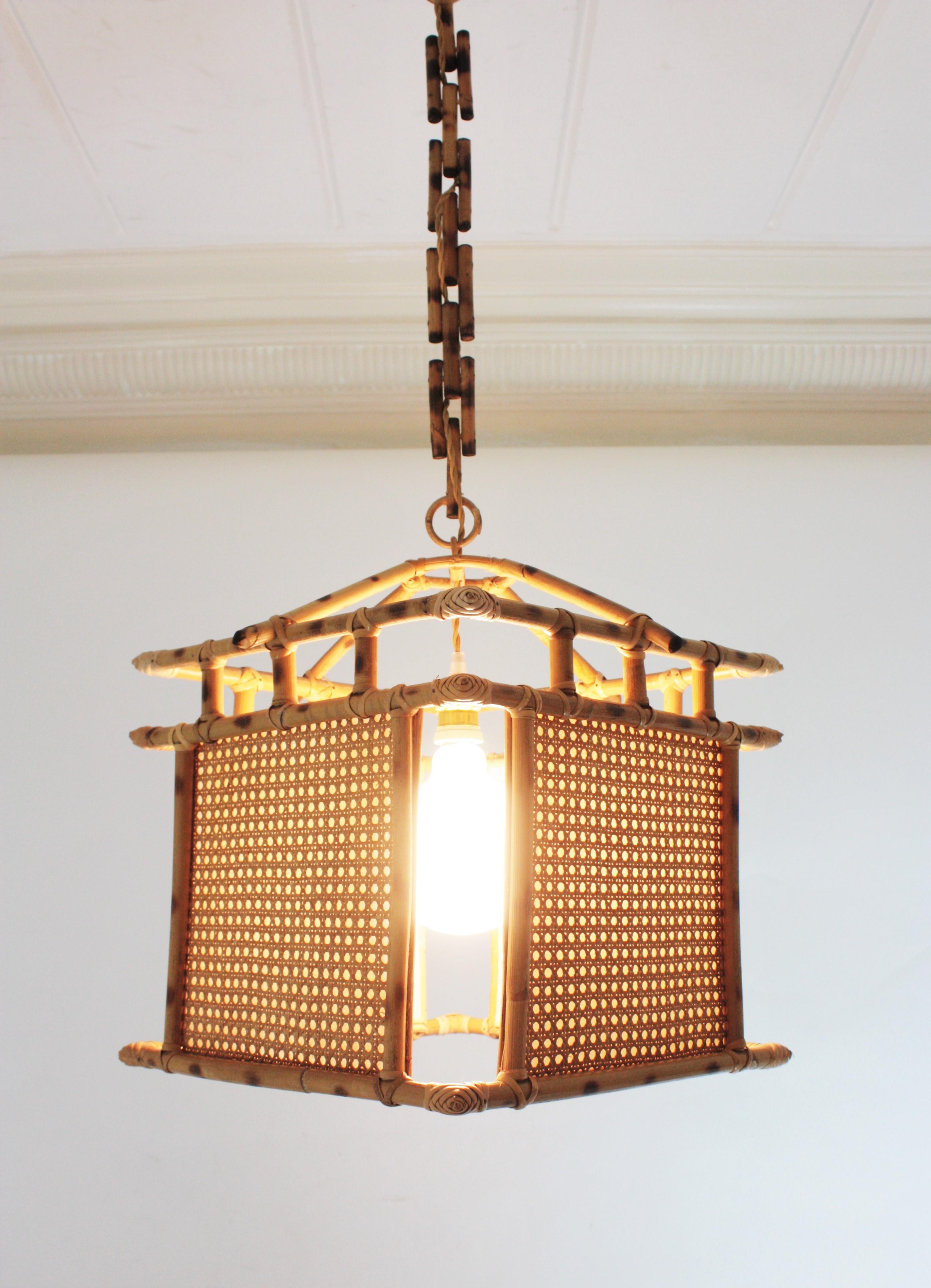 Bamboo Large Spanish Rattan Wicker Wire Pendant Lantern Chinoiserie Inspired, 1960s For Sale