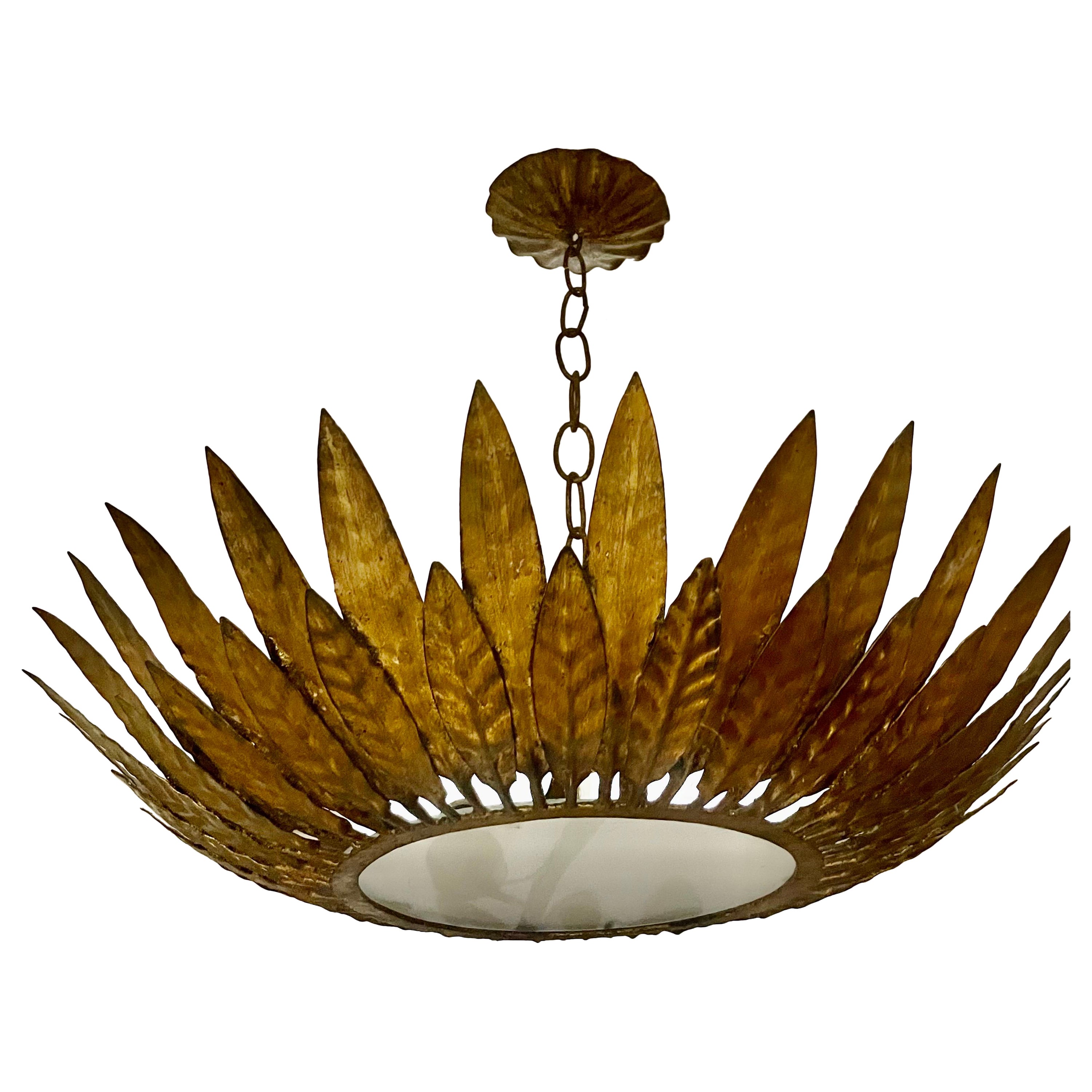 Large Spanish Sunburst fixture in Gilt Metal with support, circa 1950