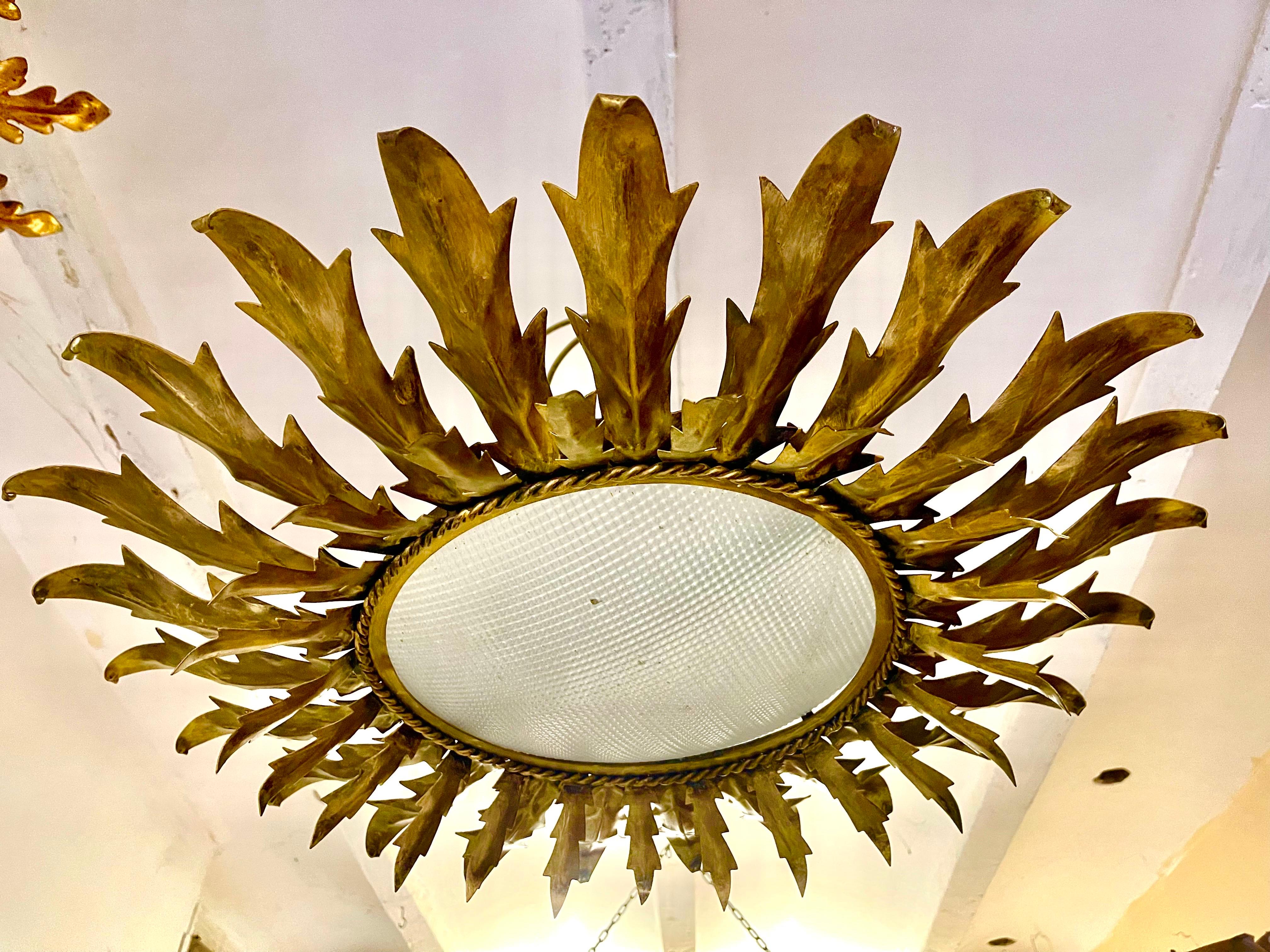 Mid-Century Modern Large Spanish Sunburst Flush Mount round curve glass , circa 1950 For Sale