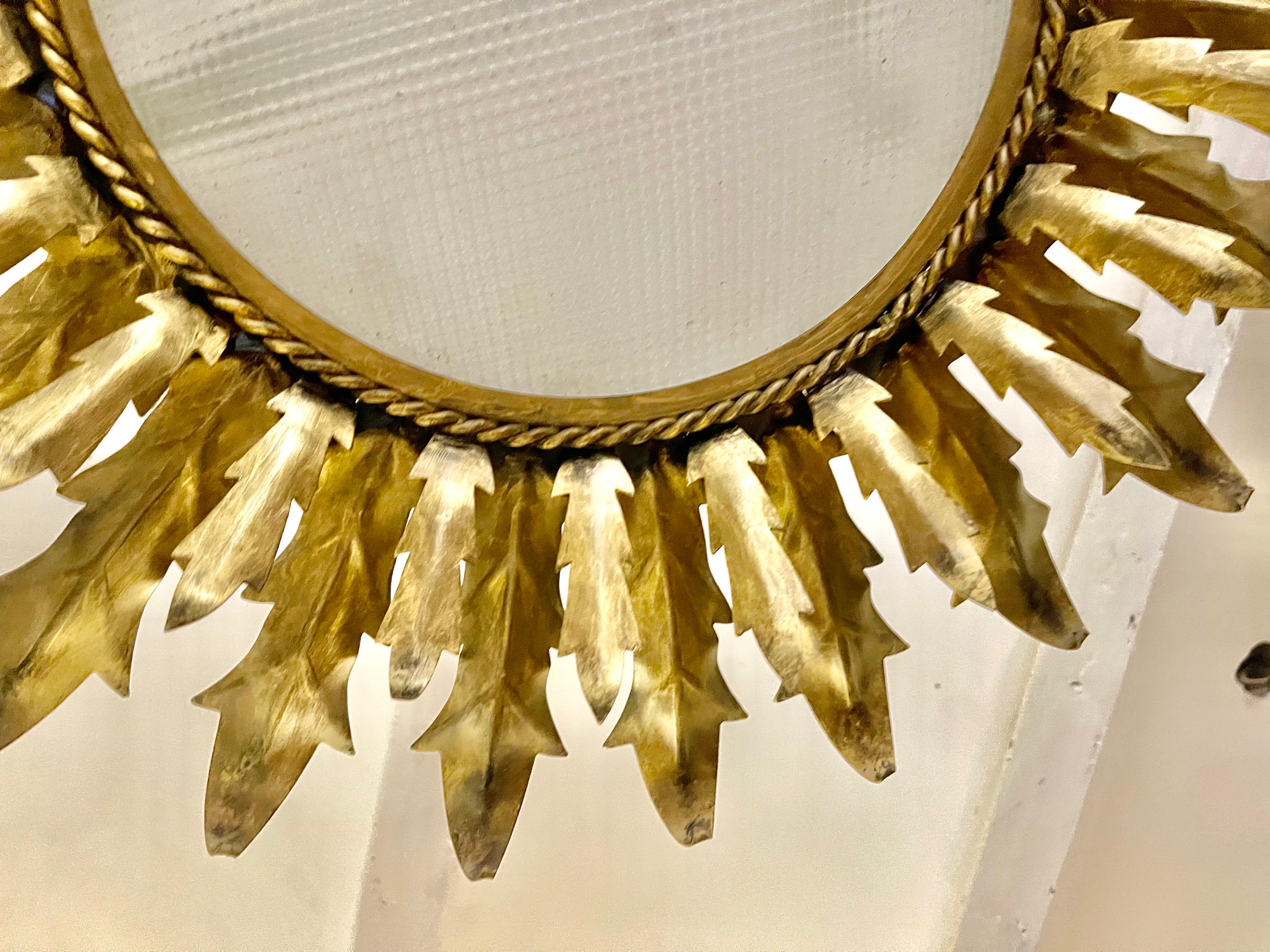 Metal Large Spanish Sunburst Flush Mount round curve glass , circa 1950 For Sale