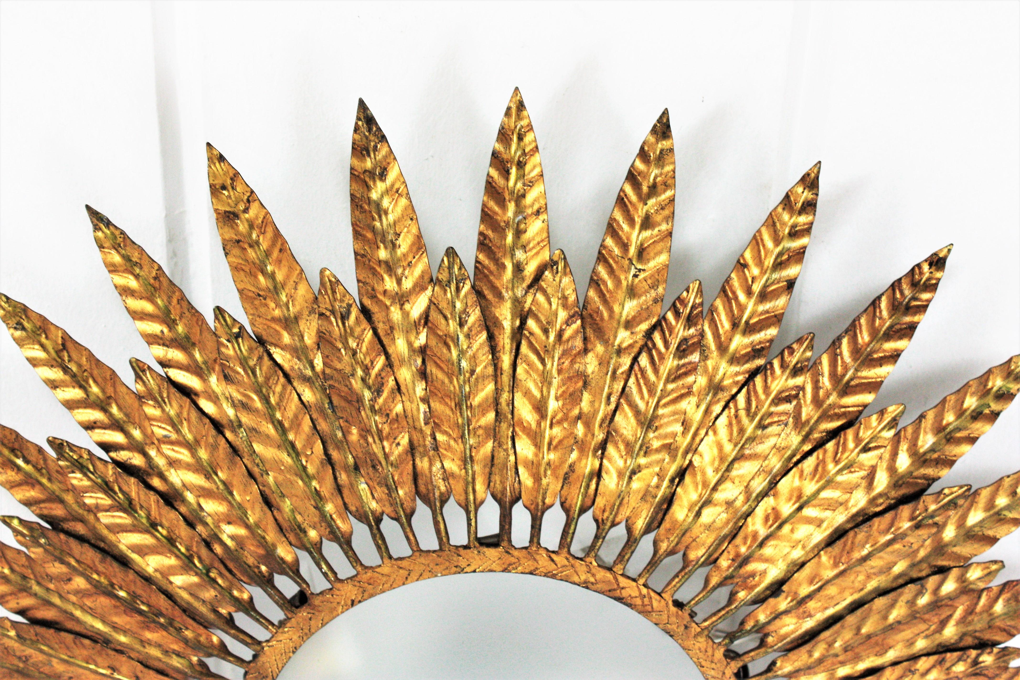 20th Century Gilt Iron Sunburst Leafed Light Fixture with Frosted Glass, Spain, 1950s For Sale