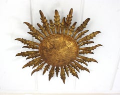 Large Spanish Sunburst Light Fixture in Wrought Gilt Iron, 1950s