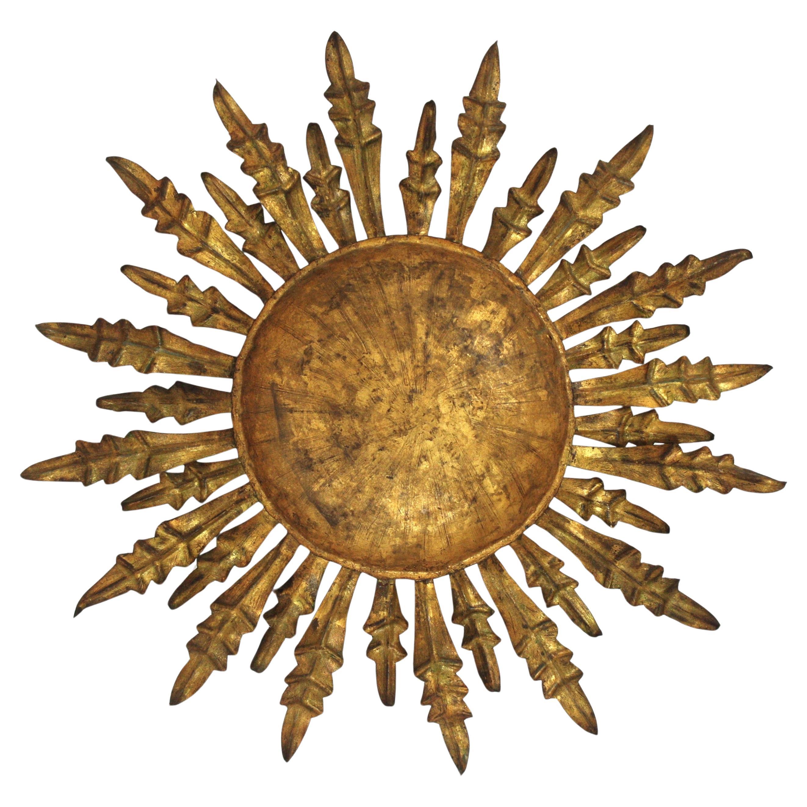 Large Spanish Sunburst Light Fixture in Wrought Gilt Iron, 1950s For Sale