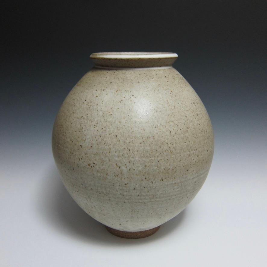 Speckled White Moon Jar by Jason Fox.

A Southern Californian for over half his life, Contemporary Ceramic Artist Jason Fox draws upon his classical education in Architecture and Art History as well as his love of surfing and the ocean. He works