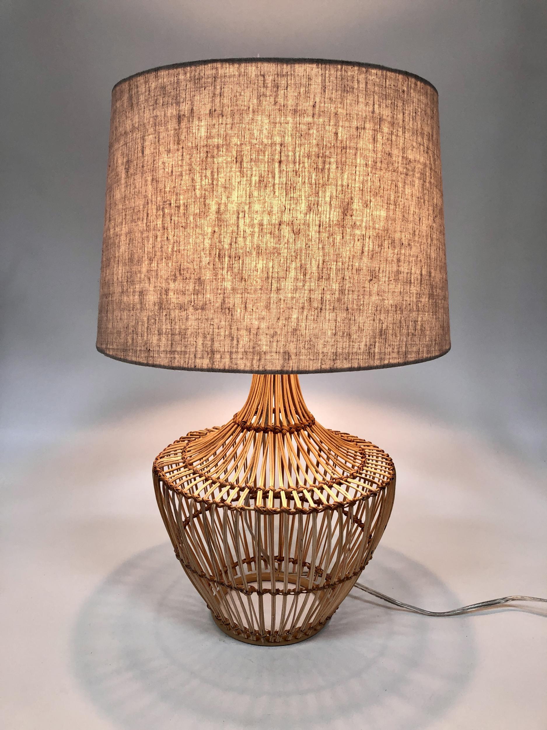 Large Albini style split rattan wicker wrapped basket weave table lamp pair, w/ shades

Lamp with shade: 23