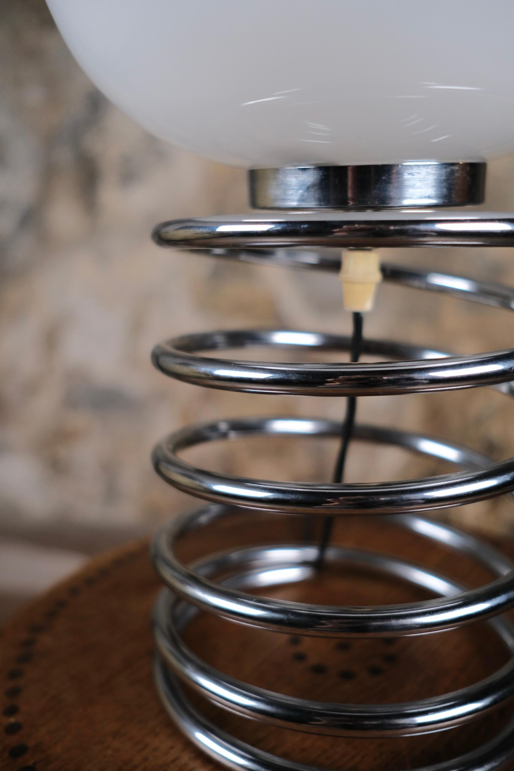 French Large spring table lamp, Galeries Lafayette, France, 1970s For Sale