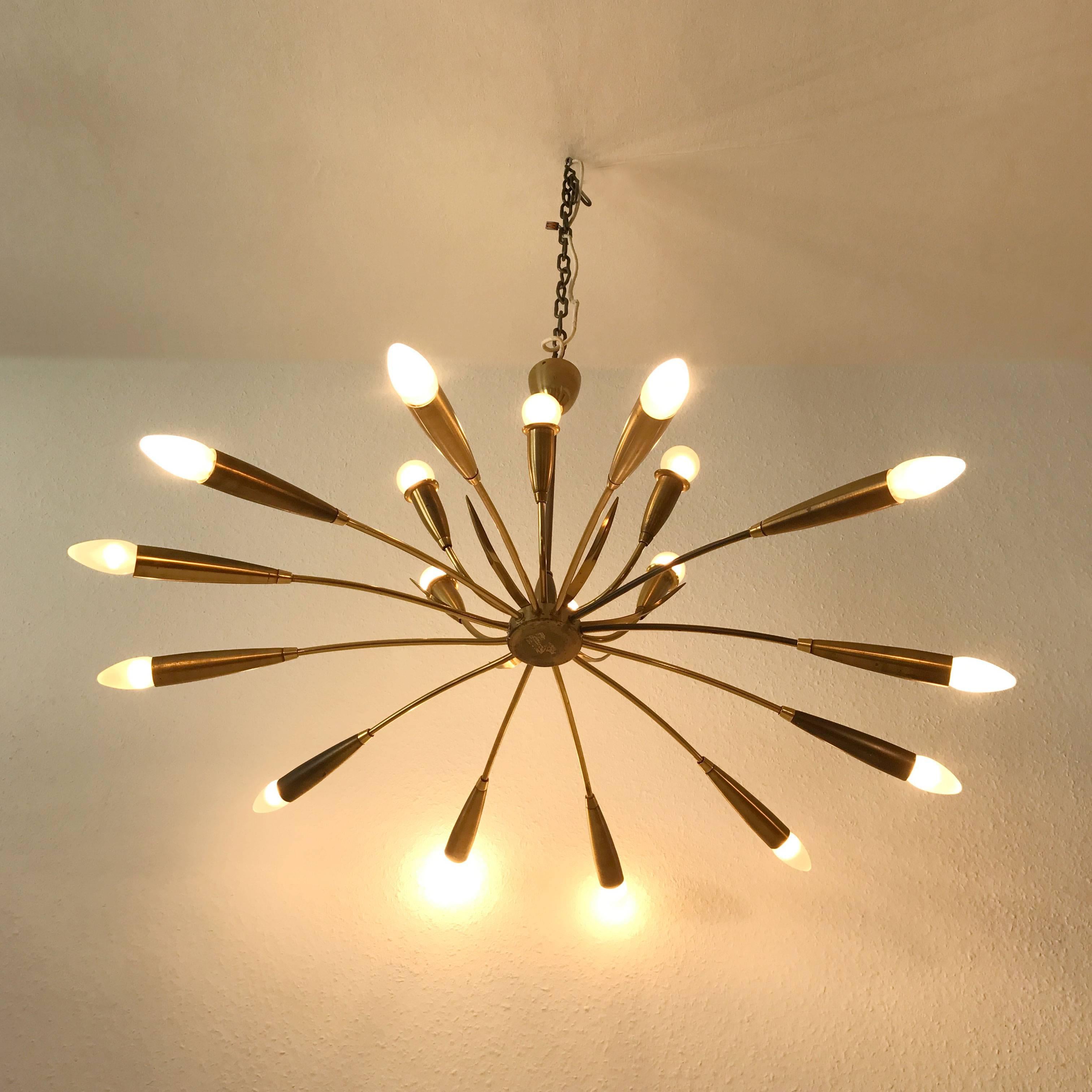 Large Sputnik chandelier with 18 arms. Manufactured in 1950s, Germany. The lamp needs 18 x E14 screw fit bulbs.