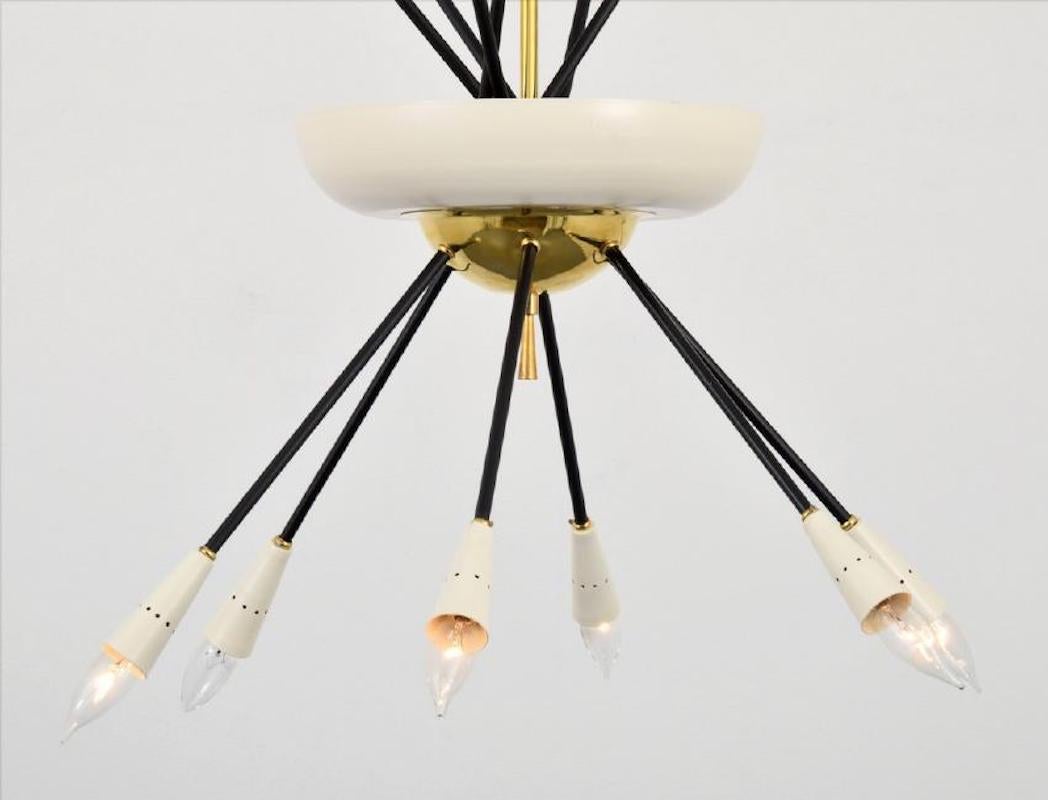 Gorgeous large chandelier attributed to Stilnovo, circa 1960. Sputnik style with brass, enamel and chrome accents.