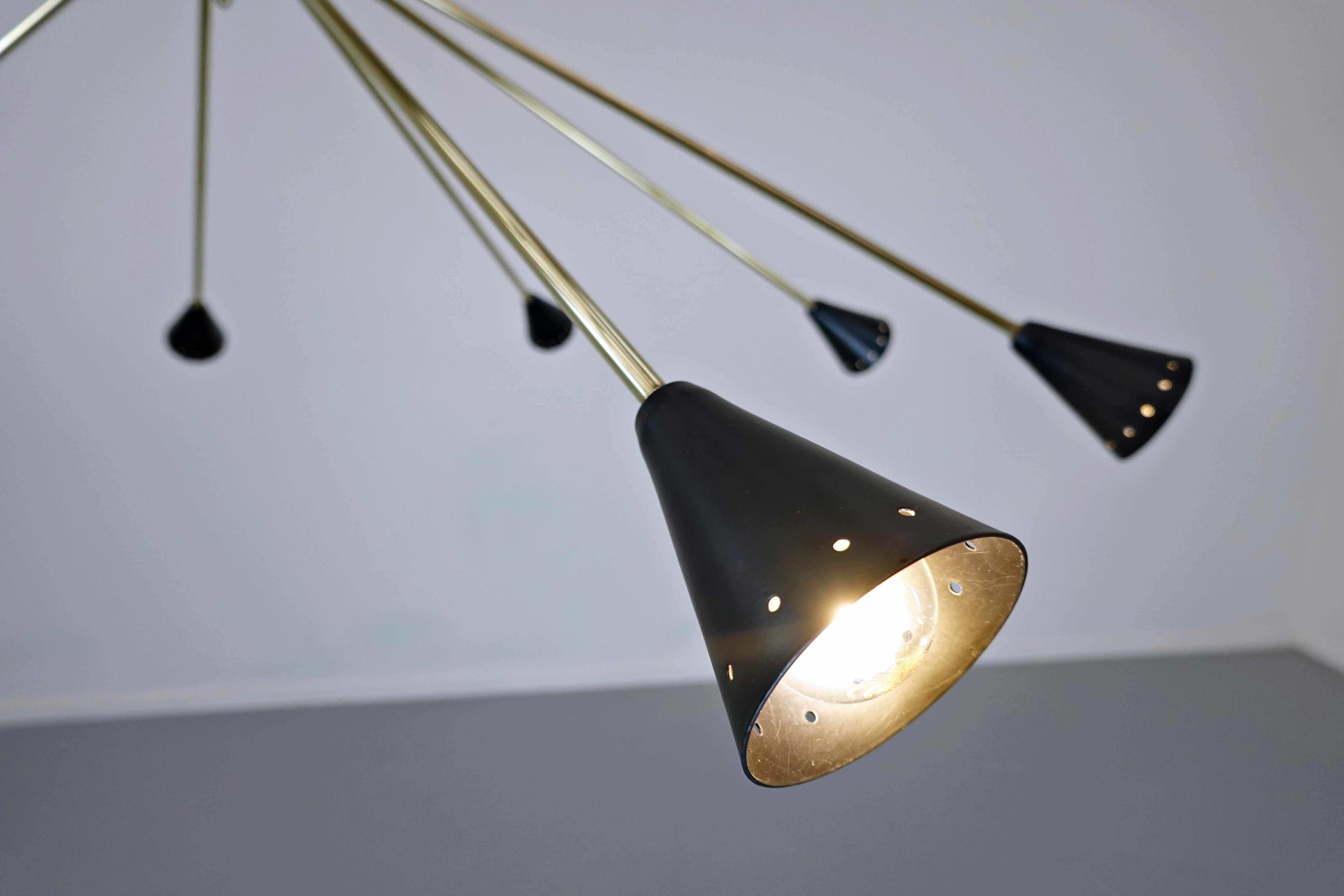 Large sputnik ceiling light, brass and metal, 1960s.
 
  