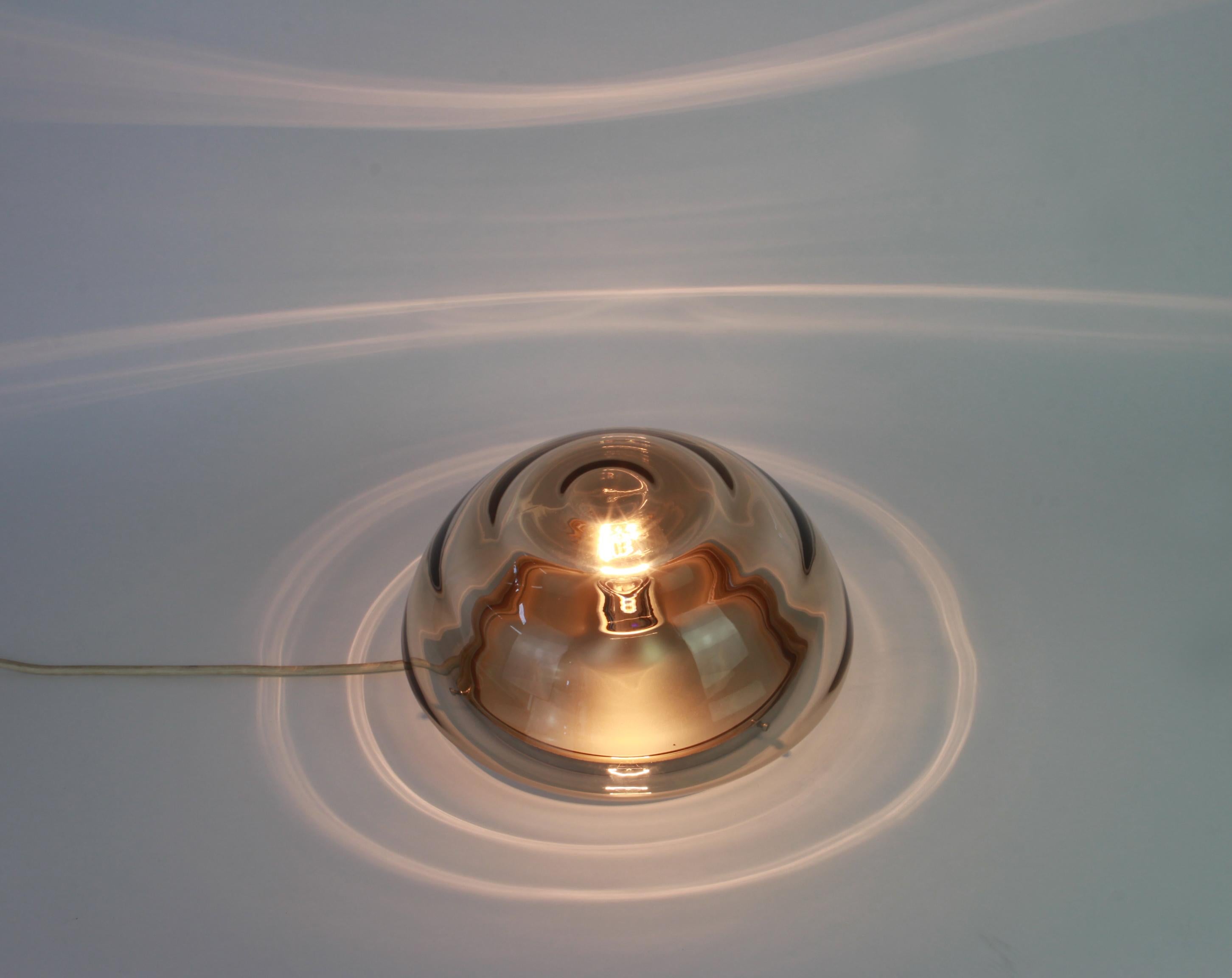 Vintage Sputnik lamp from the 1970s manufactured by Cosack, Germany, 1970s.
This lamp can be used as a ceiling lamp, or as a wall lamp.
Wonderful Murano glass shape.
Sockets: 1 x E27 standard bulb and function on voltage from 110 till 240 volts.