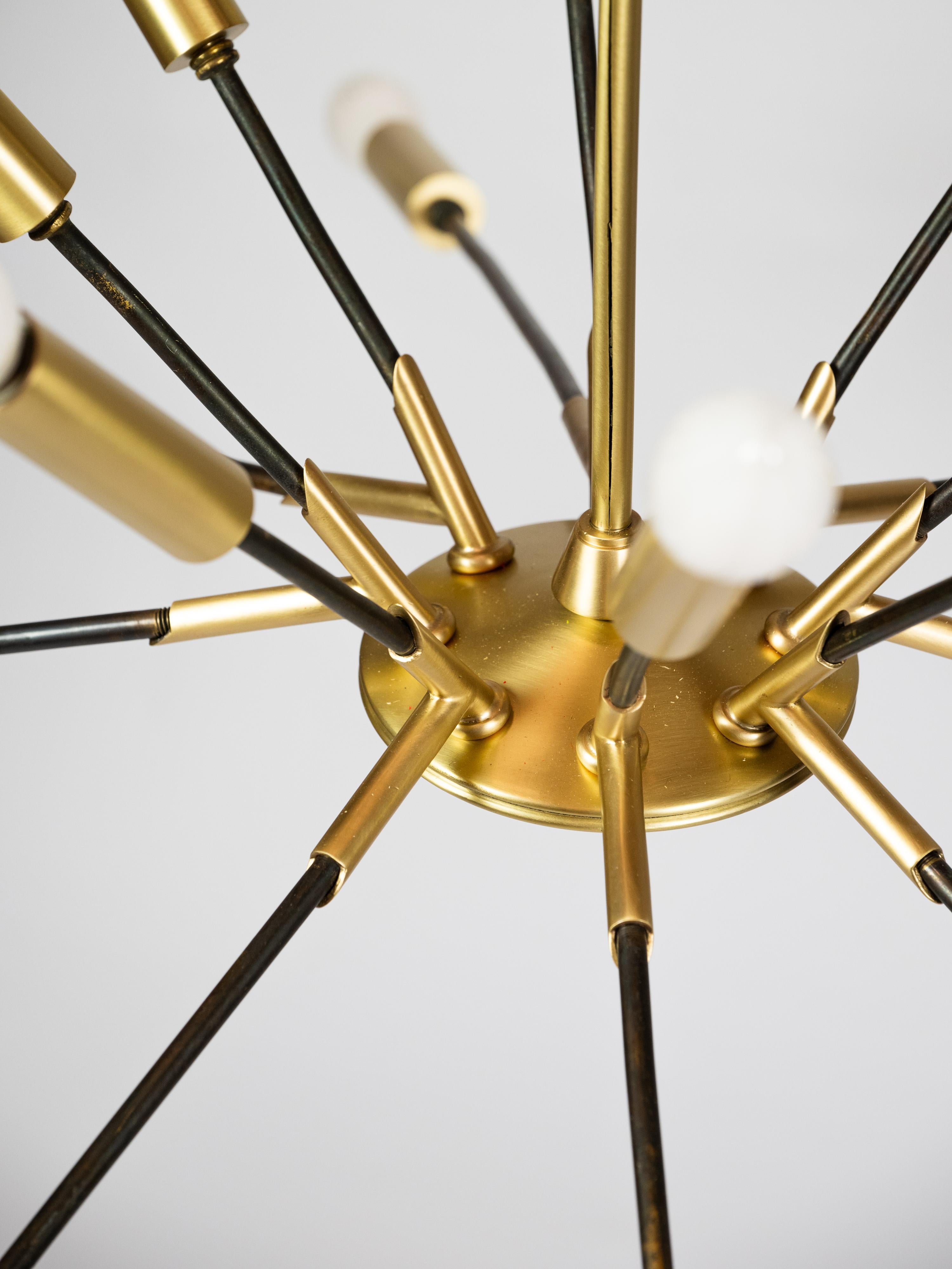 Incredible large sputnik pendant light in brass and gun metal. 

New electrical system, new brass patina. 

D 94 x H 90cm 

Italian work circa 1950

More information upon request 