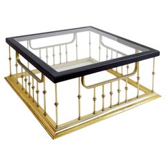 Large square coffee table in “fireplace fender