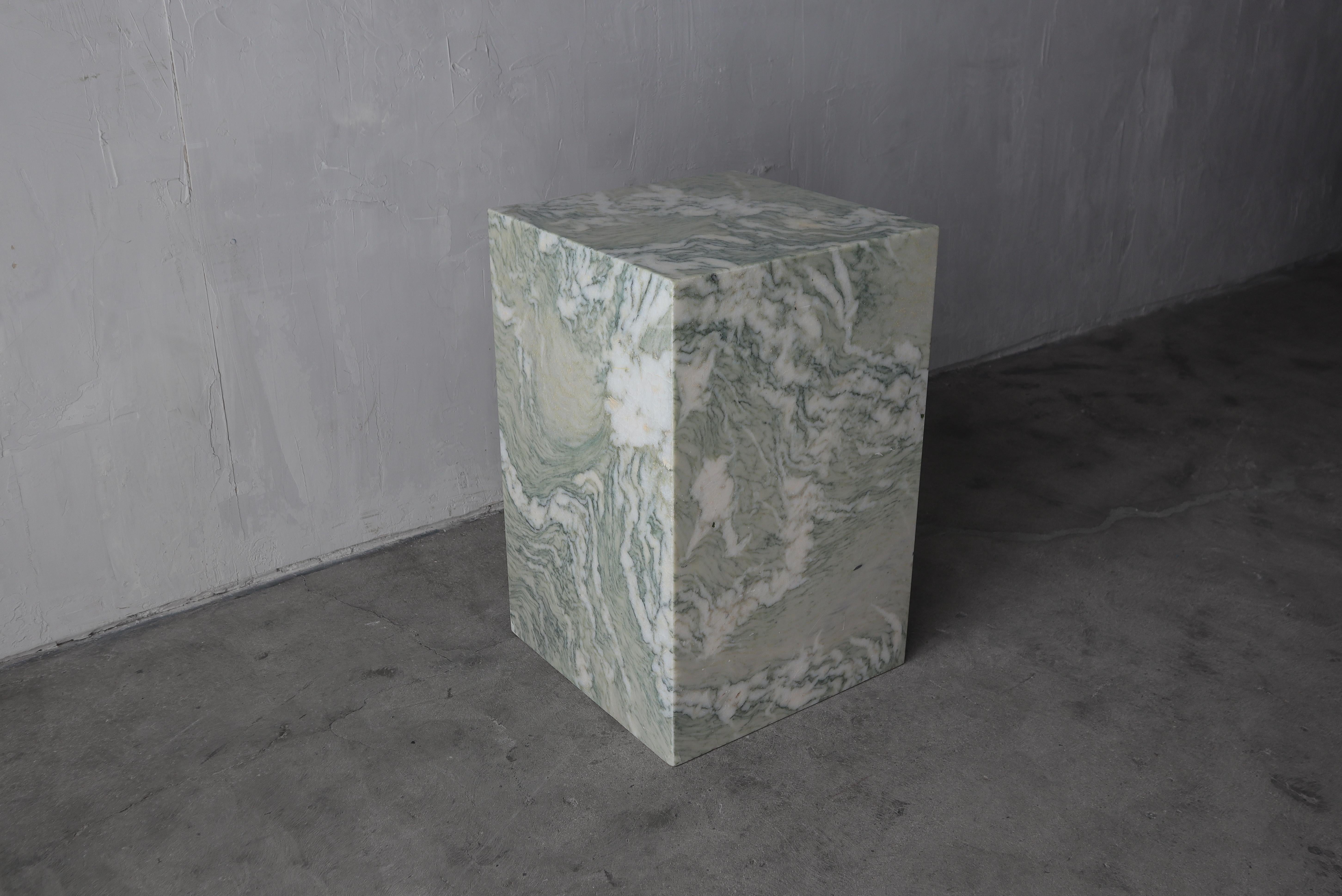 Stunning green marble rectangular pedestal. Perfect for displaying your favorite sculpture or art piece. Can also be used as a high side table.

The pedestal measures 28