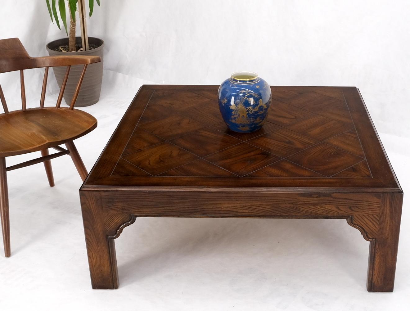 Large decorative square parquetry style coffee table by Henredon. Very solid and heavy construction table.