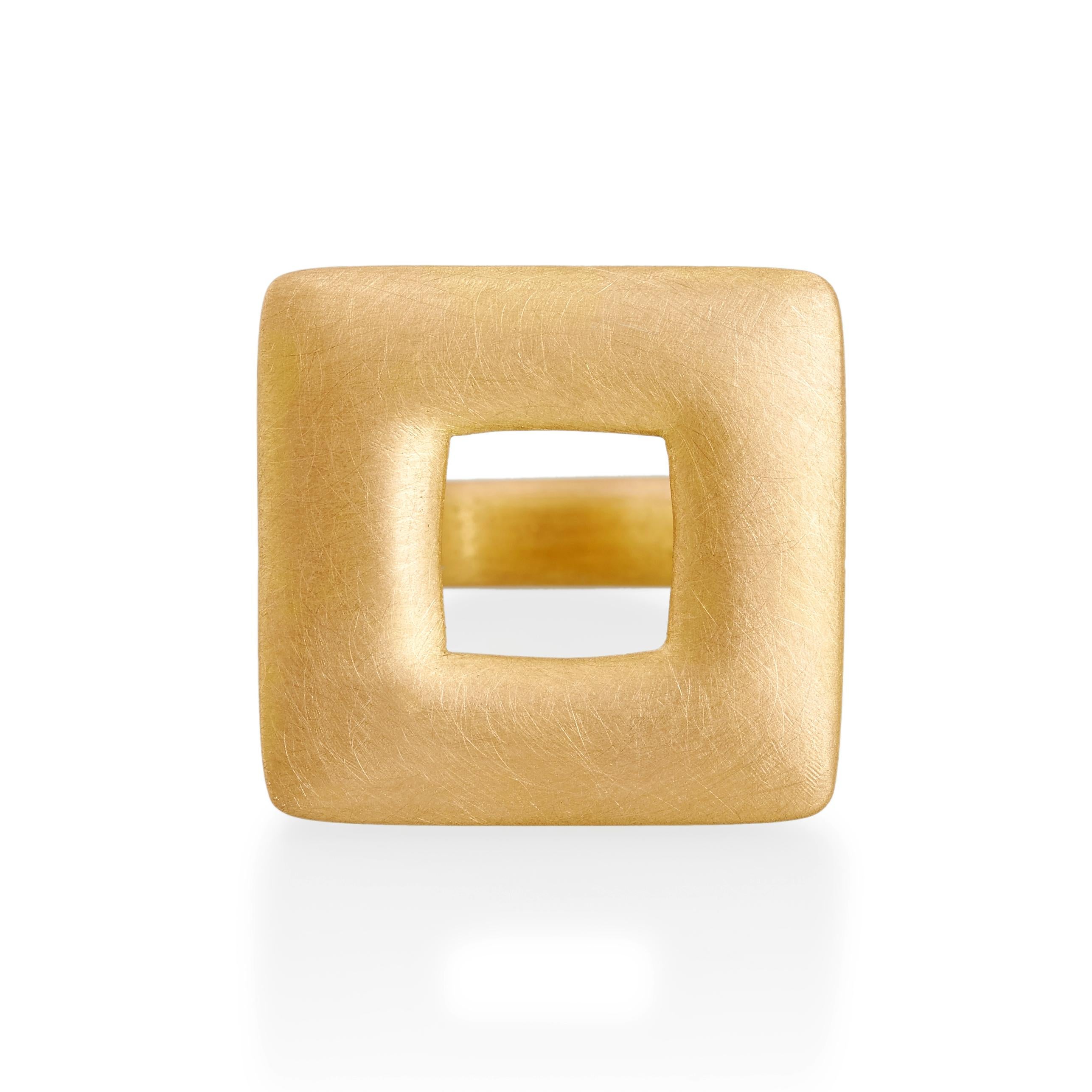 Hand carved large square ring in solid 22ct gold with a matte finish. Strong contemporary design and selected as 'Object of the Day' at Goldsmiths' Fair by Boodles.

ref: S17004

24mm square  
22ct gold

Cadby & Co are a family business that