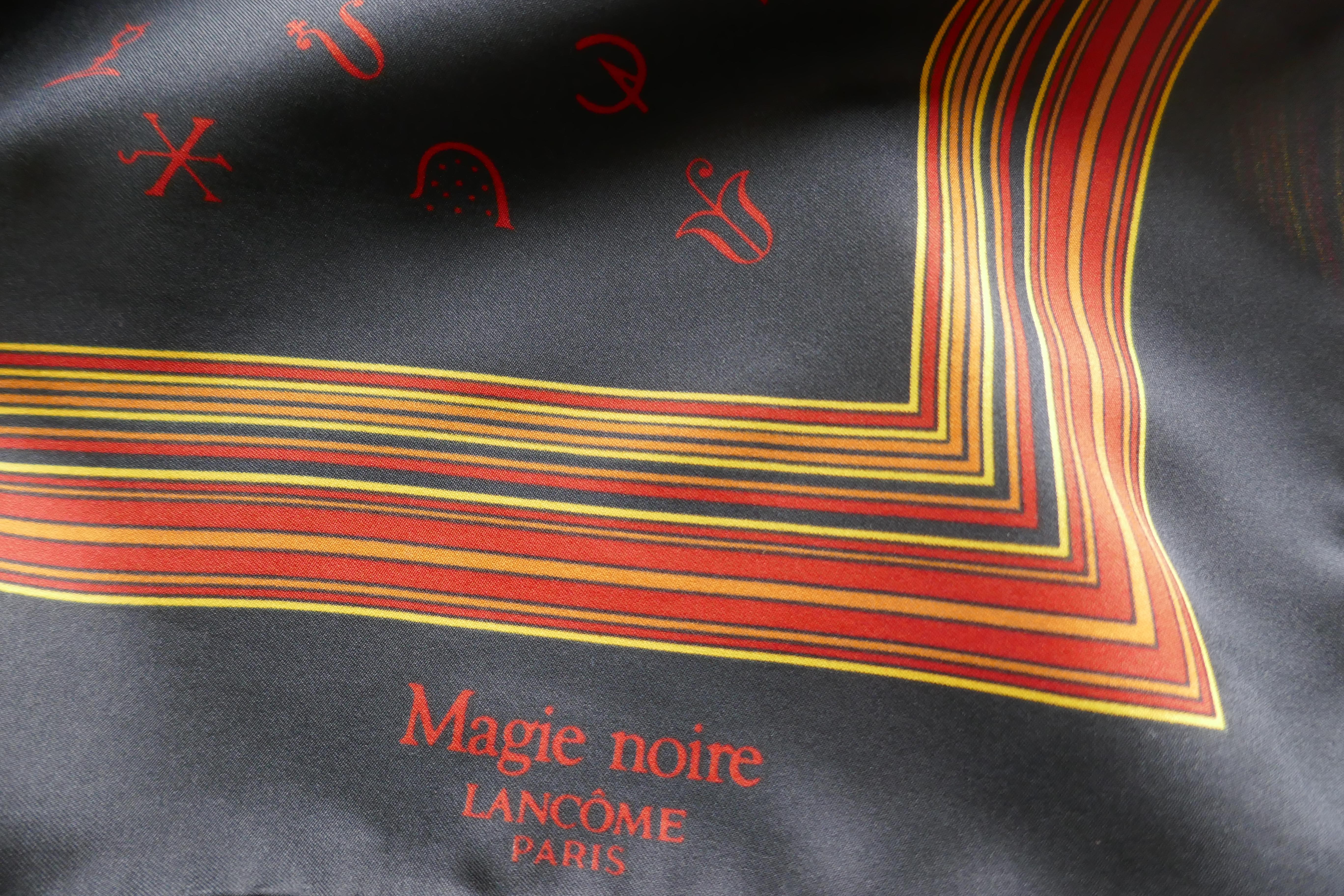 Large Square Scarf, Magie Noire for Lancôme Paris

Black magic symbols in red on a black background, with a bright red and orange striped border
A lovely scarf in unworn condition, Very rare one for the collector 
Polyester 
The Scarf is 31”x