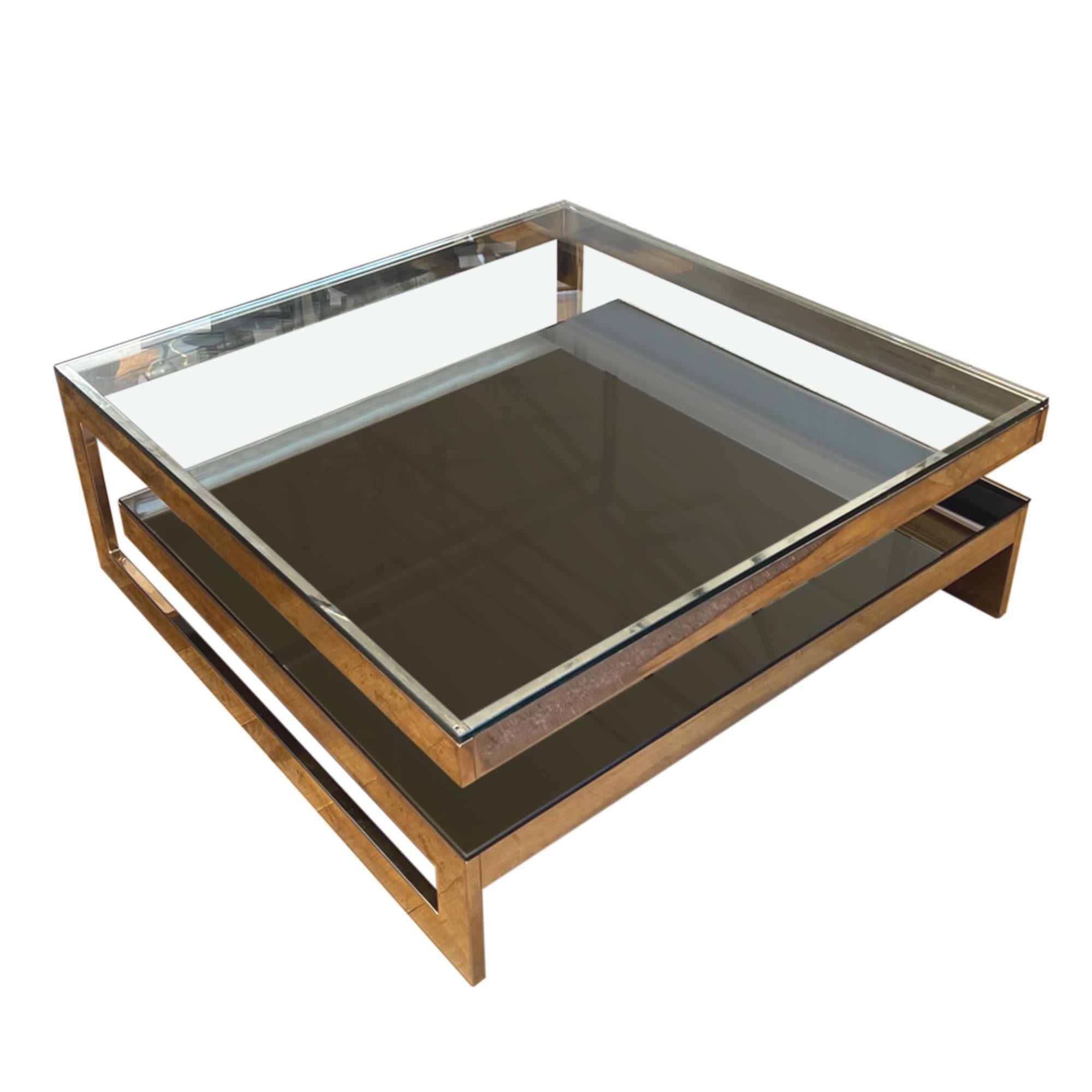 Dieser große quadratische Couchtisch aus der Mitte des Jahrhunderts ist ein Klassiker des belgischen Möbelherstellers und Designers Belgo Chrom. 

Er ist aus hochwertigen Materialien gefertigt und hat ein brillantes Design. Dieses Stück aus den