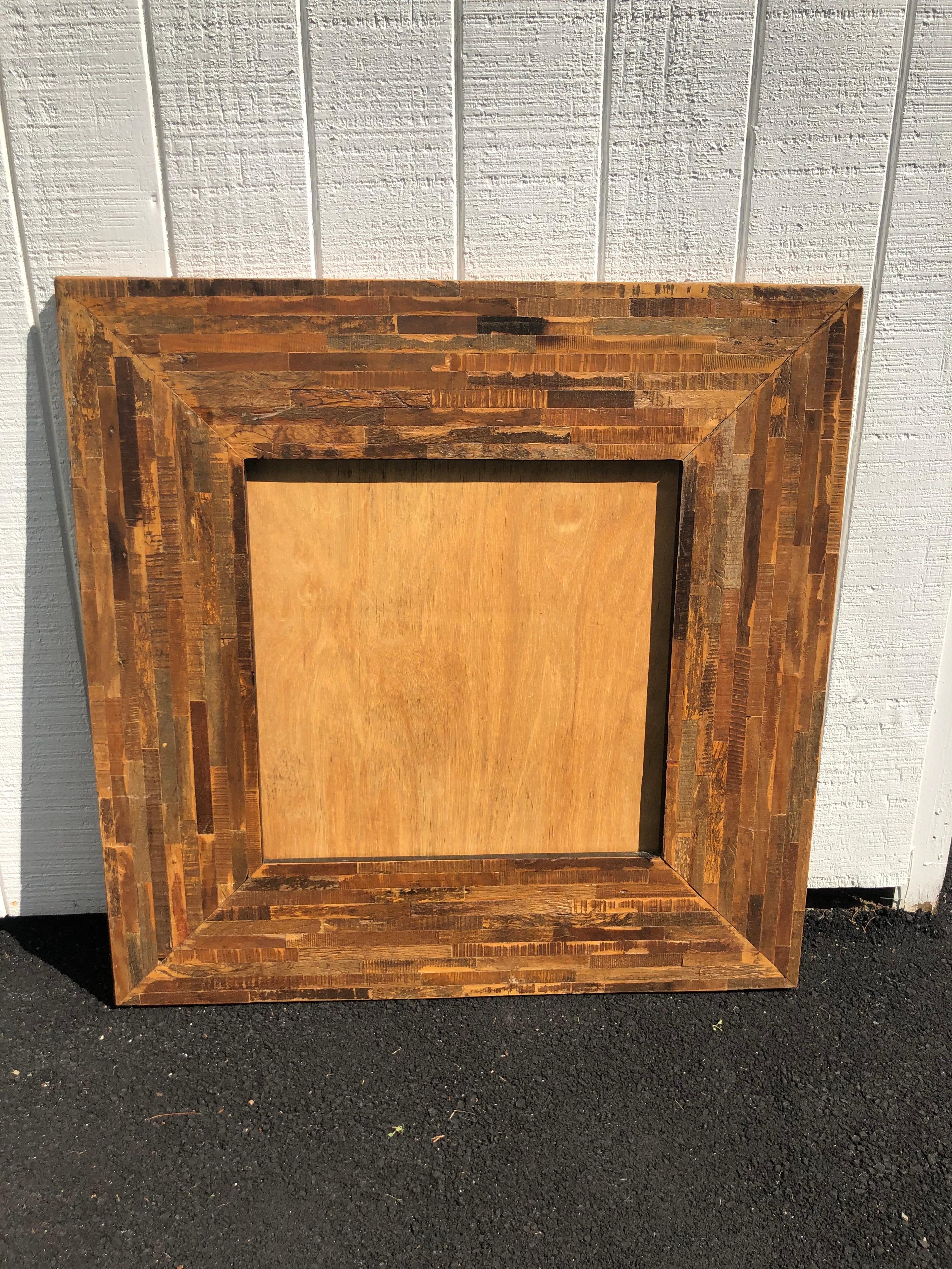 Huge square wooden frame for a large mirror or artwork. Solid atchwork iece. Heavy and solid. Use to give some texture to a room. Perfect for a lodge bulletin board or rustic restaurant. Add corkboard or a mirror. Or a iece of art.