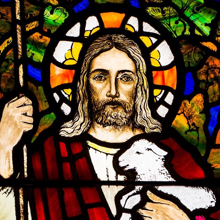 Stained glass window in very good condition, produced circa 1930. Reclaimed from a church in Fife, Scotland. 

The window depicts Jesus with the words 'He leadeth me to the still waters' written on the scroll held above his head. by two