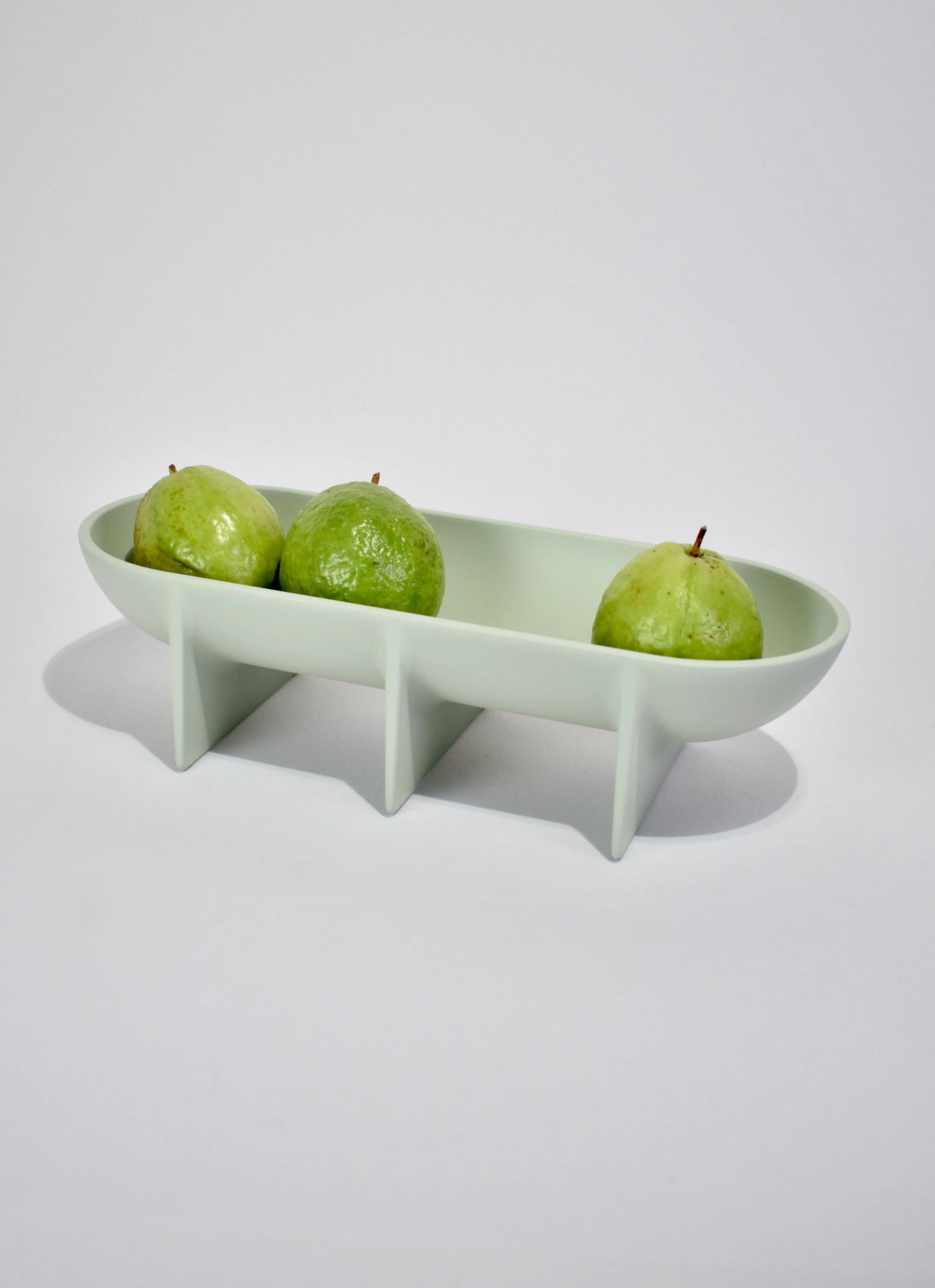 Stunning, large footed bowl in sage by FS Objects. Place as a centerpiece on your favorite table or enjoy in the kitchen as a special fruit bowl.

The die cast aluminum standing bowl is elevated off the table surface by its architecturally
