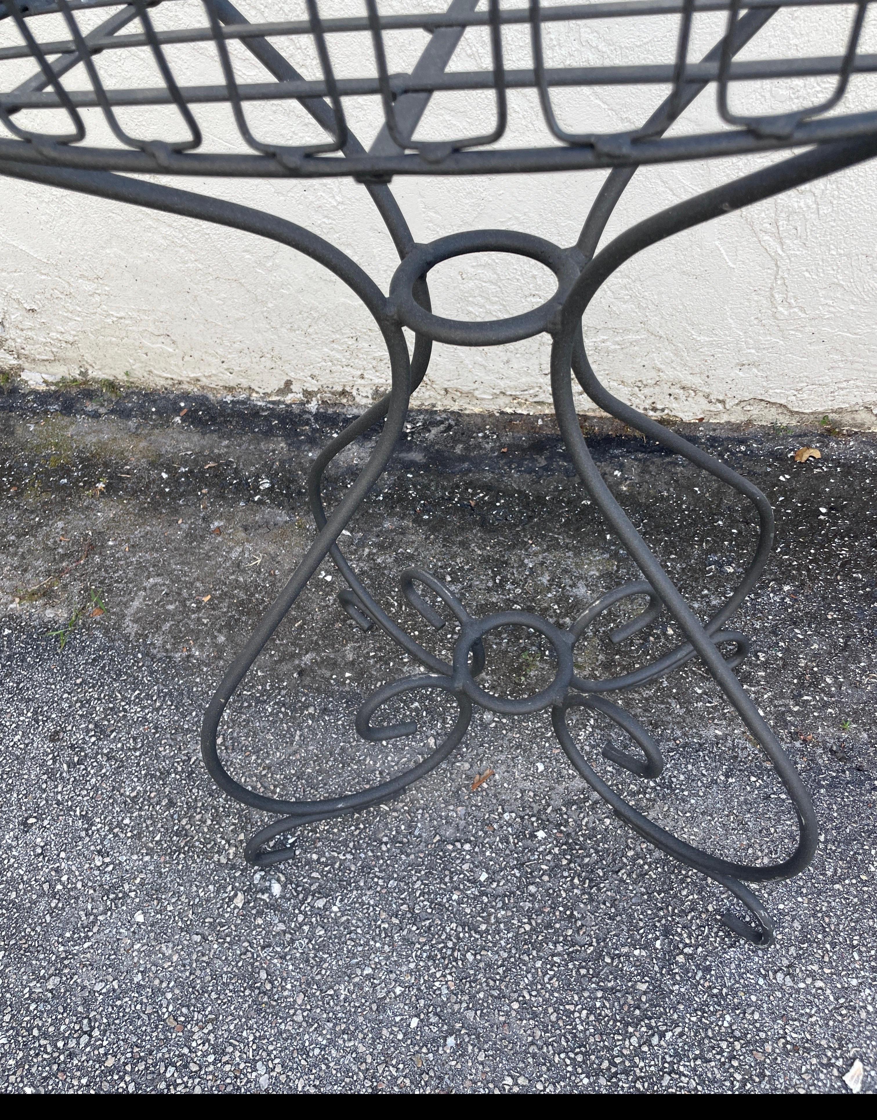 Lovely wire and iron oval standing planter. Perfect for your loggia filled with orchids.