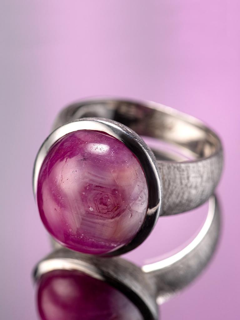 Scratched silver ring with natural star Ruby
ruby origin - Sri Lanka
gem size is 0.39 х 0.55 х 0.63 in / 10 х 14 х 16 mm
ring weight - 12.10 grams
ruby weight - 25.6 carats
ring size - 8.5 US