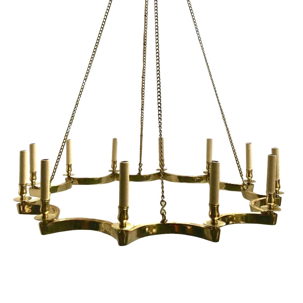 A large circa 1960's French bronze star-shaped moderne 12-arm chandelier.

Measurements:
Drop: 40