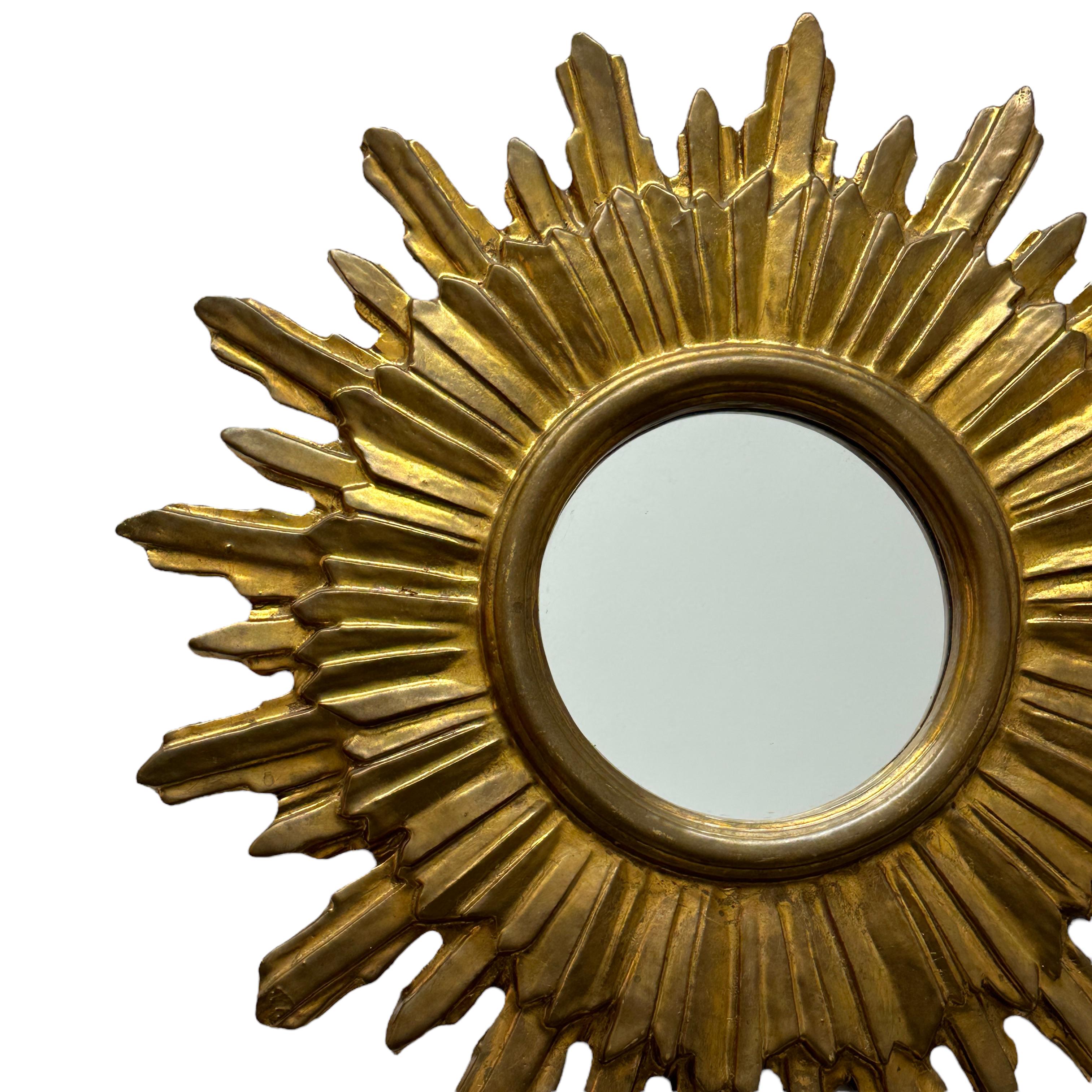 Mid-20th Century Large Starburst Sunburst Gilded Wood and Stucco Mirror, circa 1930s