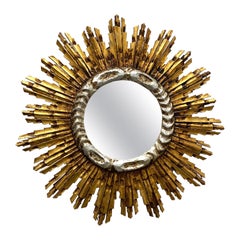 Grand miroir en bois doré en forme d'étoile:: vers les années 1930