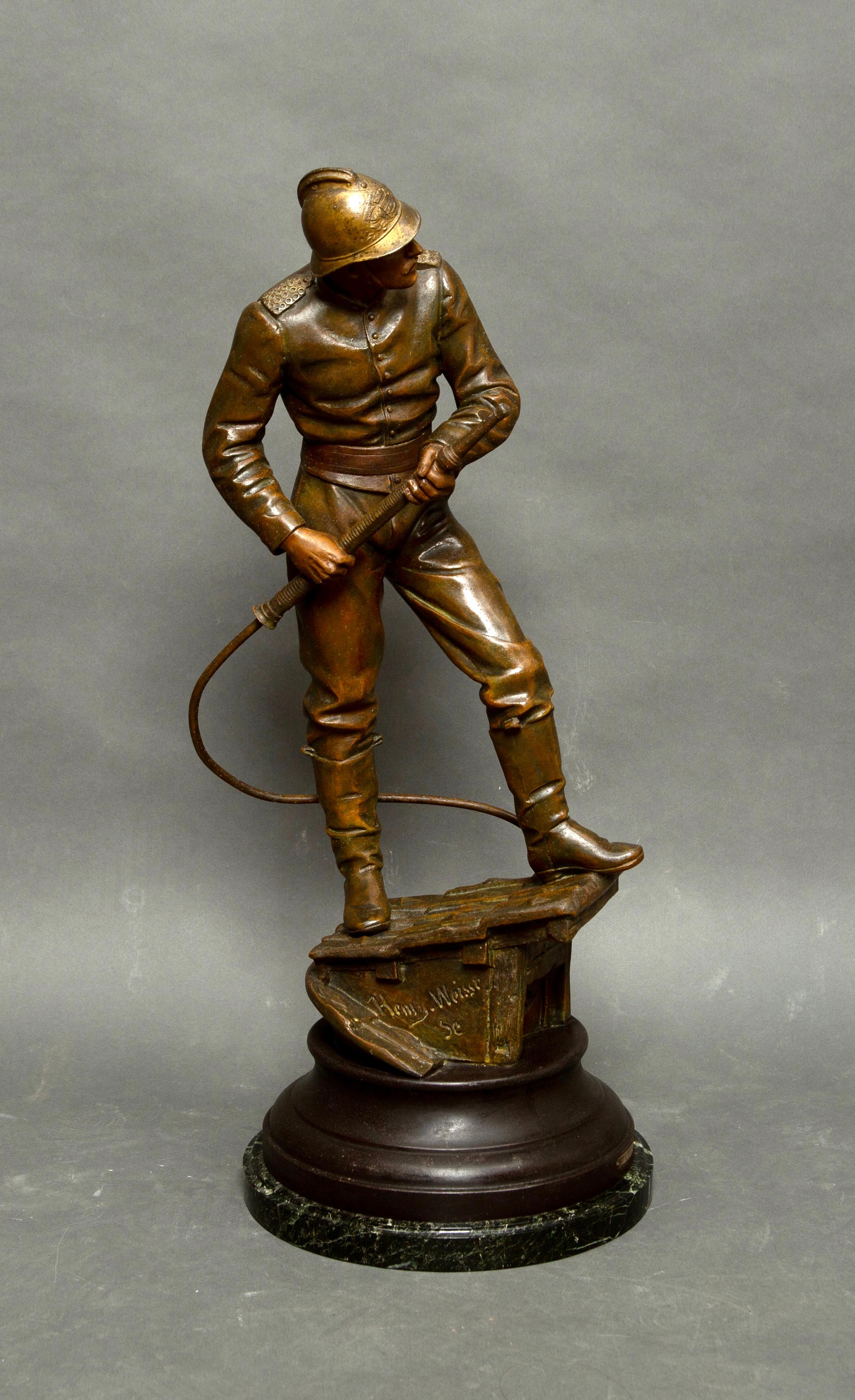 Large statue in regule metal representing a fireman of the city of Paris, under the Third Republic, in full action. The fireman, with a lance in his hand, is stationed on a roof, more precisely on a roof window, trying to put out a fire.
Medal