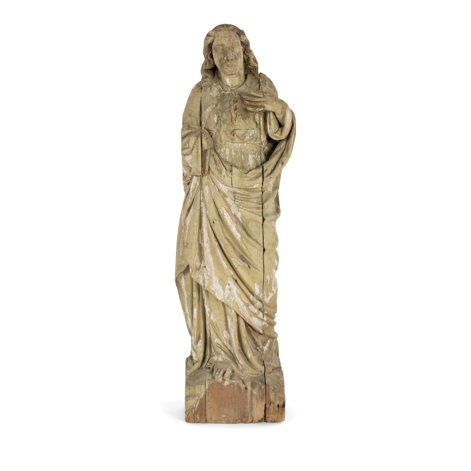 Large statue of saint hand carved in wood during the late 17th century, or early 18th century. Some restoration. Sculpture portrays a saint and originally used in a church or cathedral.

Note: Original/early finish on antique and vintage metal will