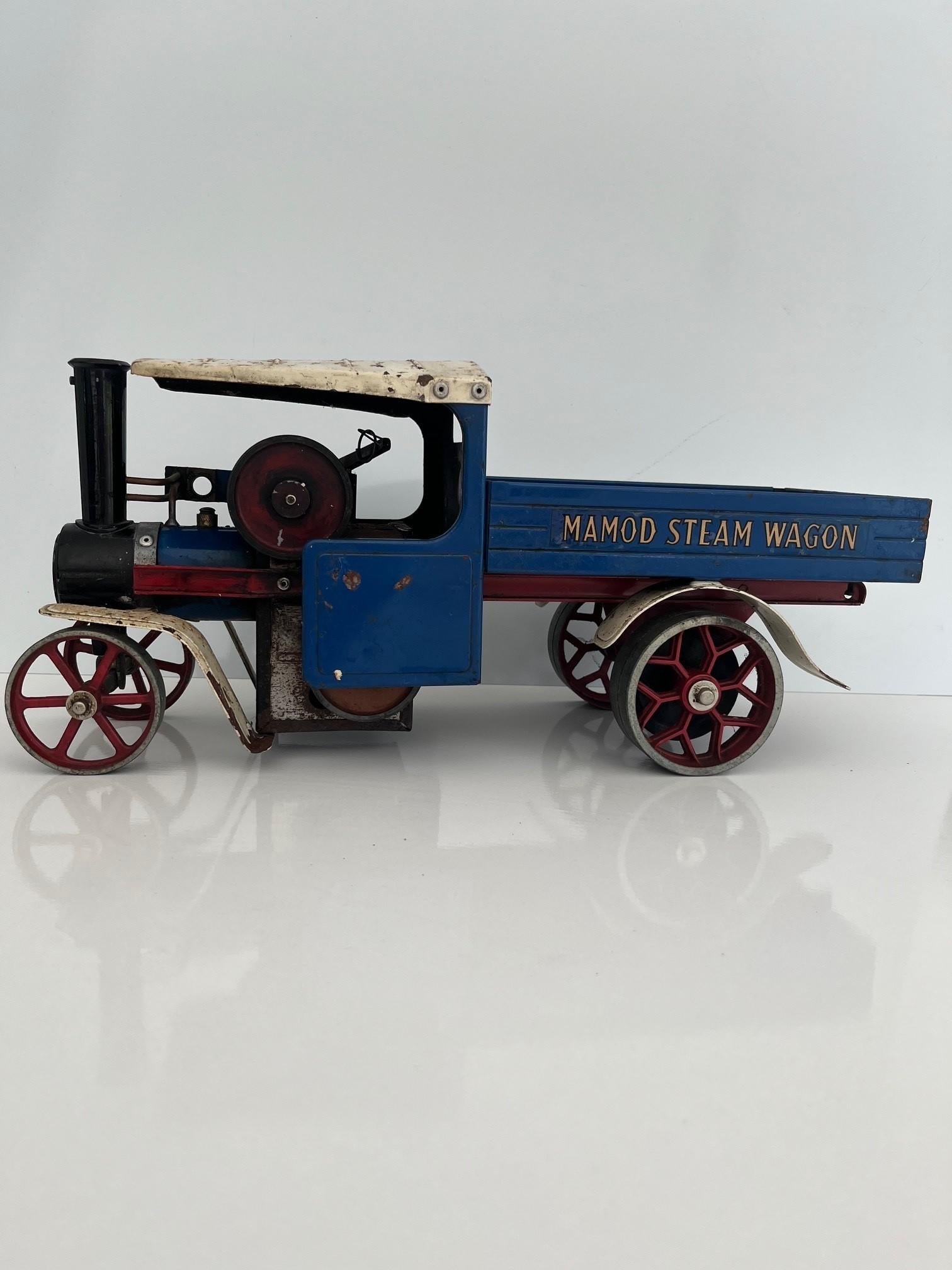 A lovely old British Made Vintage Steam Engine Model.  The piece has good scale and a beautiful vintage patina, ideal as an art piece or shelf model.
The item dates to circa 1970s when these where popular as working toys, with actual running parts,