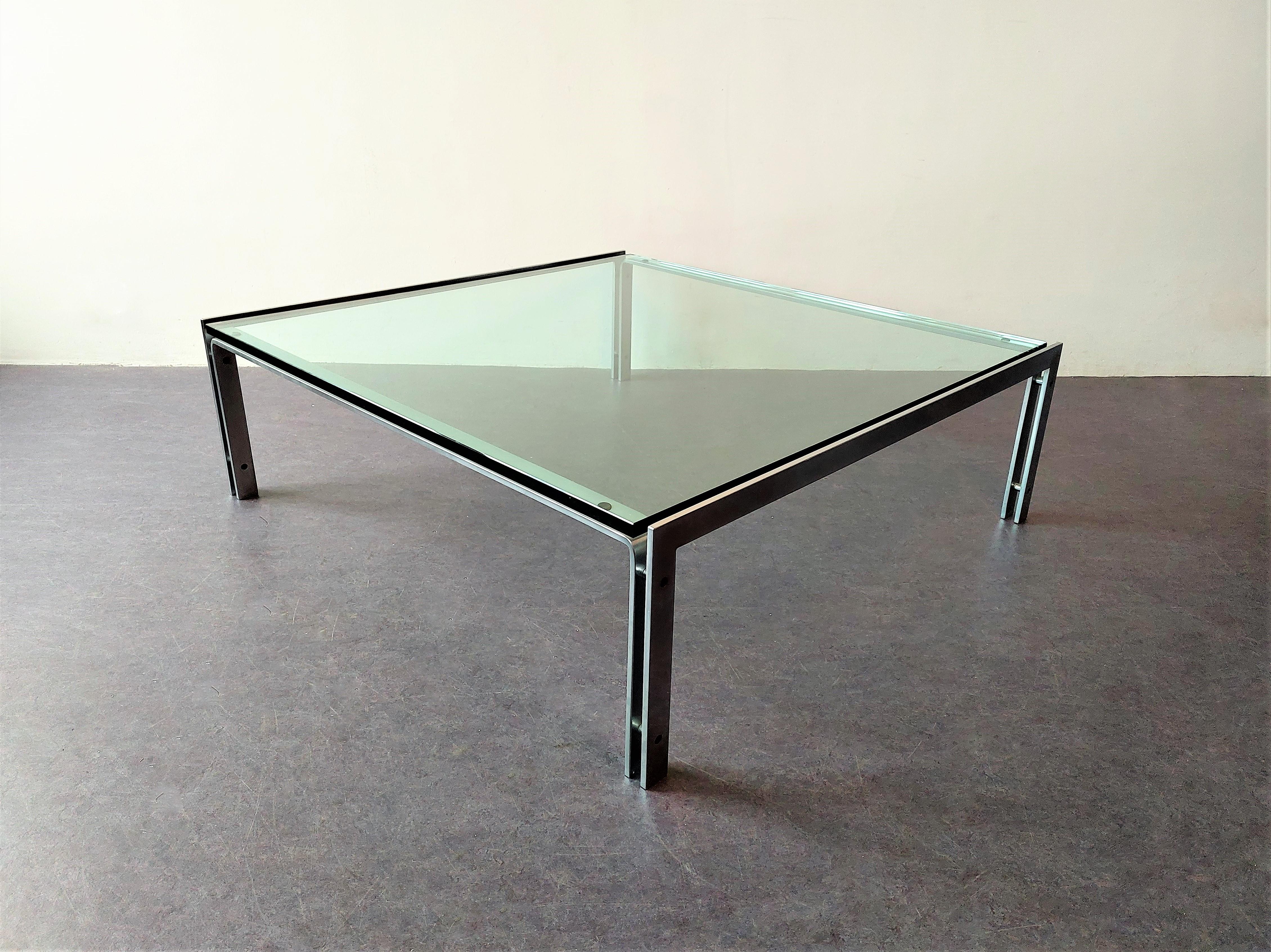 This M1 coffee table was designed by Hank Kwint for Metaform in the early 1980's. It is made out of a steel frame that supports a two cm thick and heavy glass top. A very nice and minimalistic shaped coffee table will look fantastic in any modern