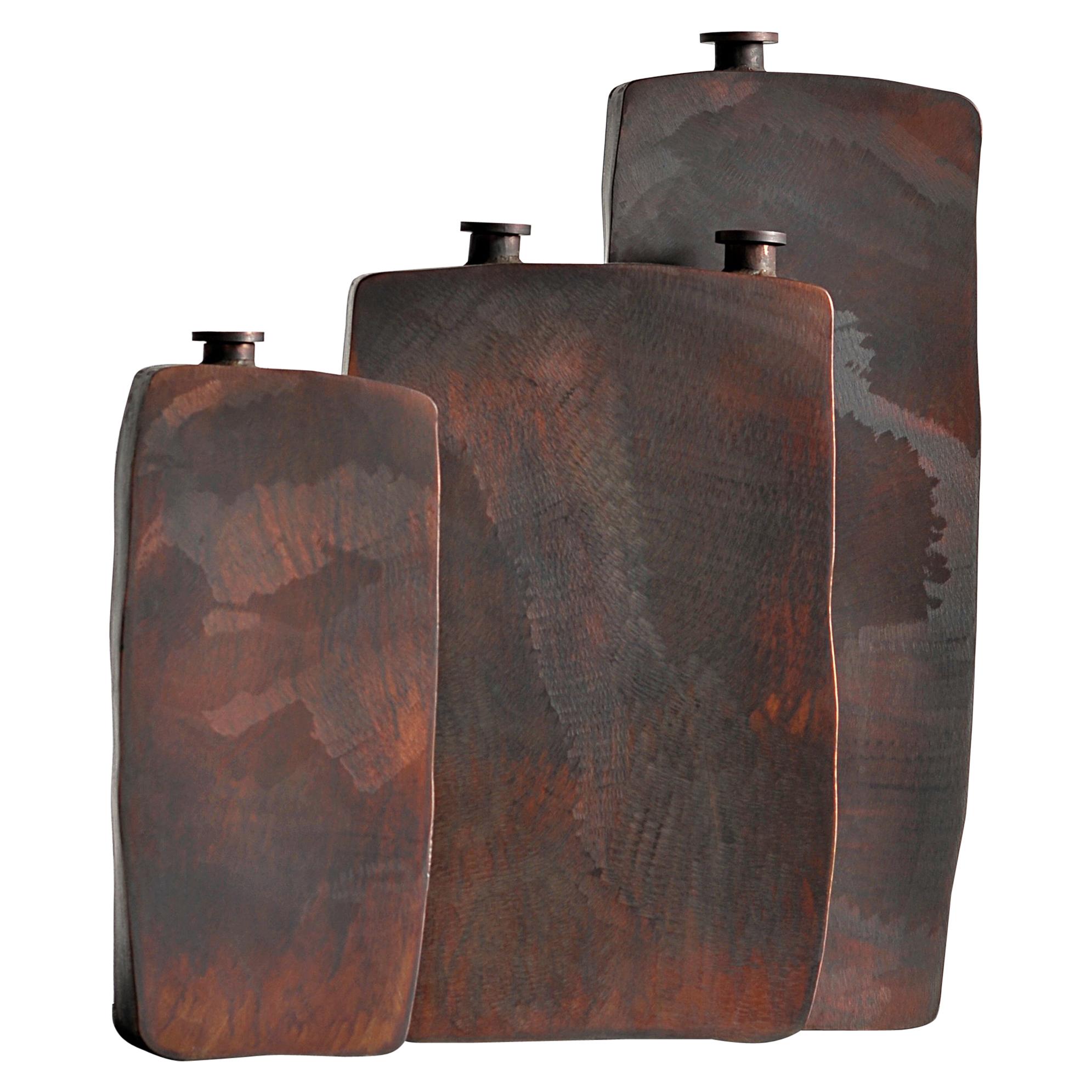Large steel brown bottle by Lukasz Friedrich
Dimensions: Large Bottle 19.5 x 4.5 x H 50 cm

Materials: Patinated steel.