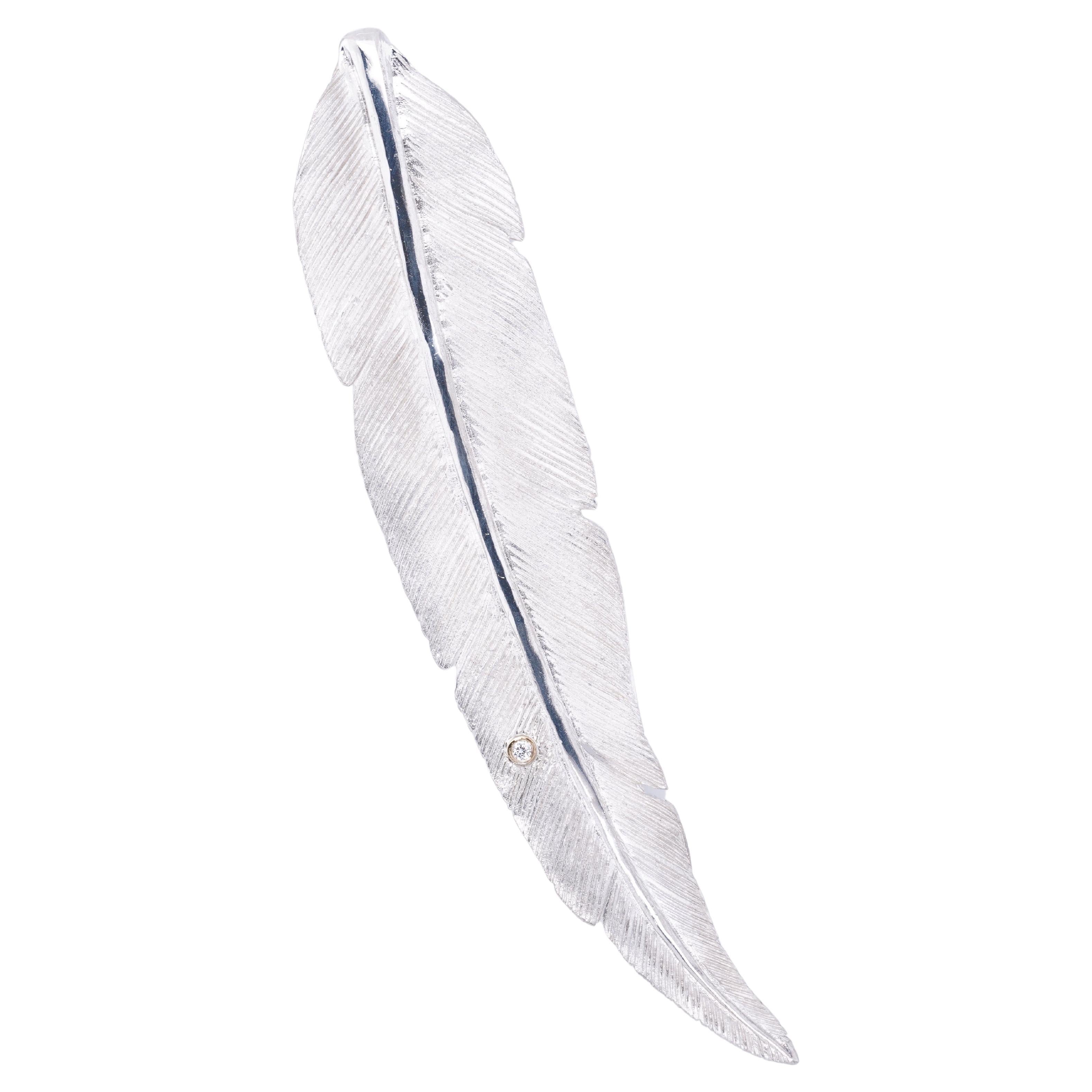 Large Sterling Silver Detailed Bird Feather Brooch Pin with Diamond Detail by Ashley Childs

This feather was originally carved by 
