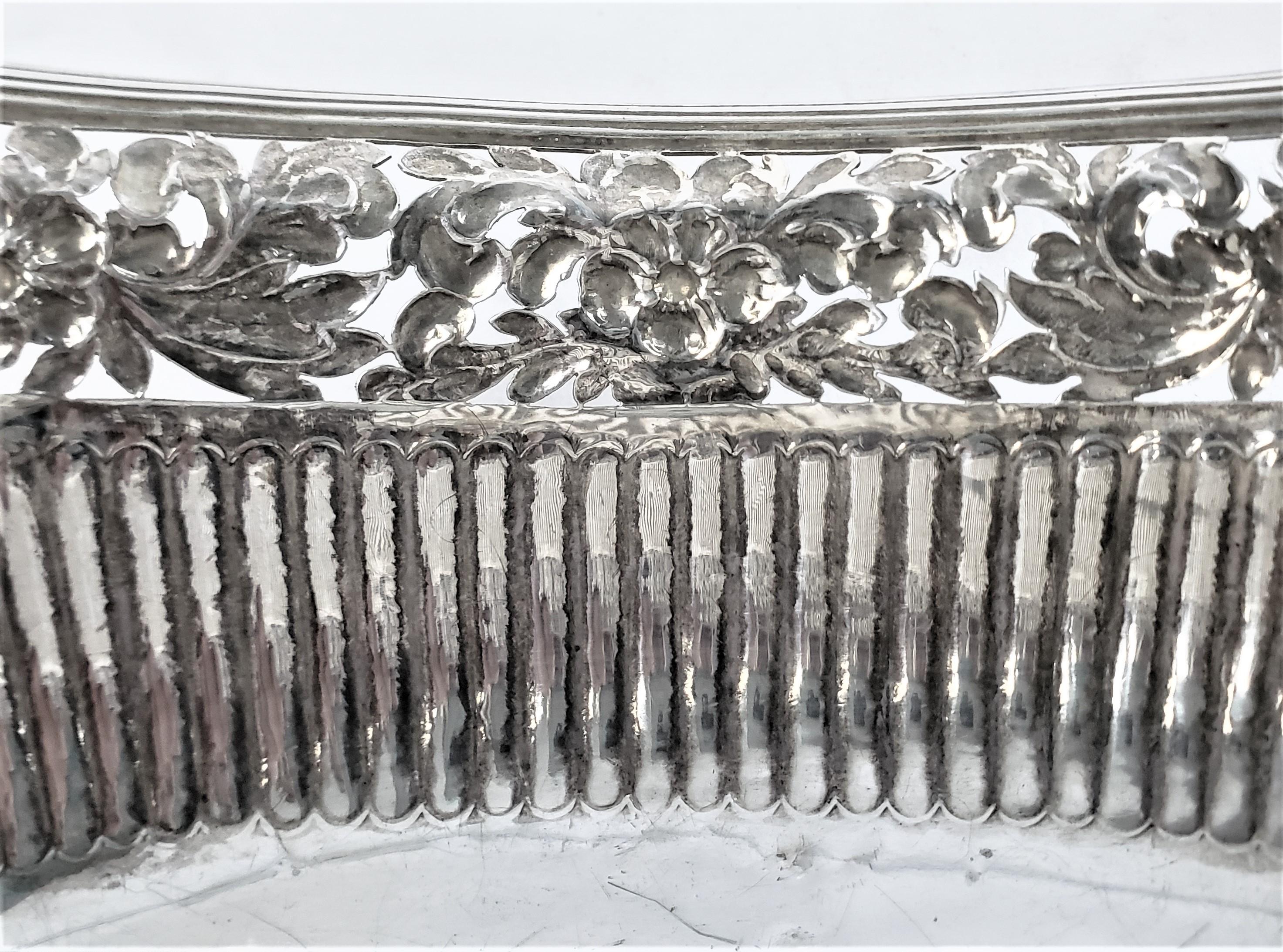 Large Sterling Silver Georgian Pierced Basket with Repousse Faces & Floral Decor For Sale 3