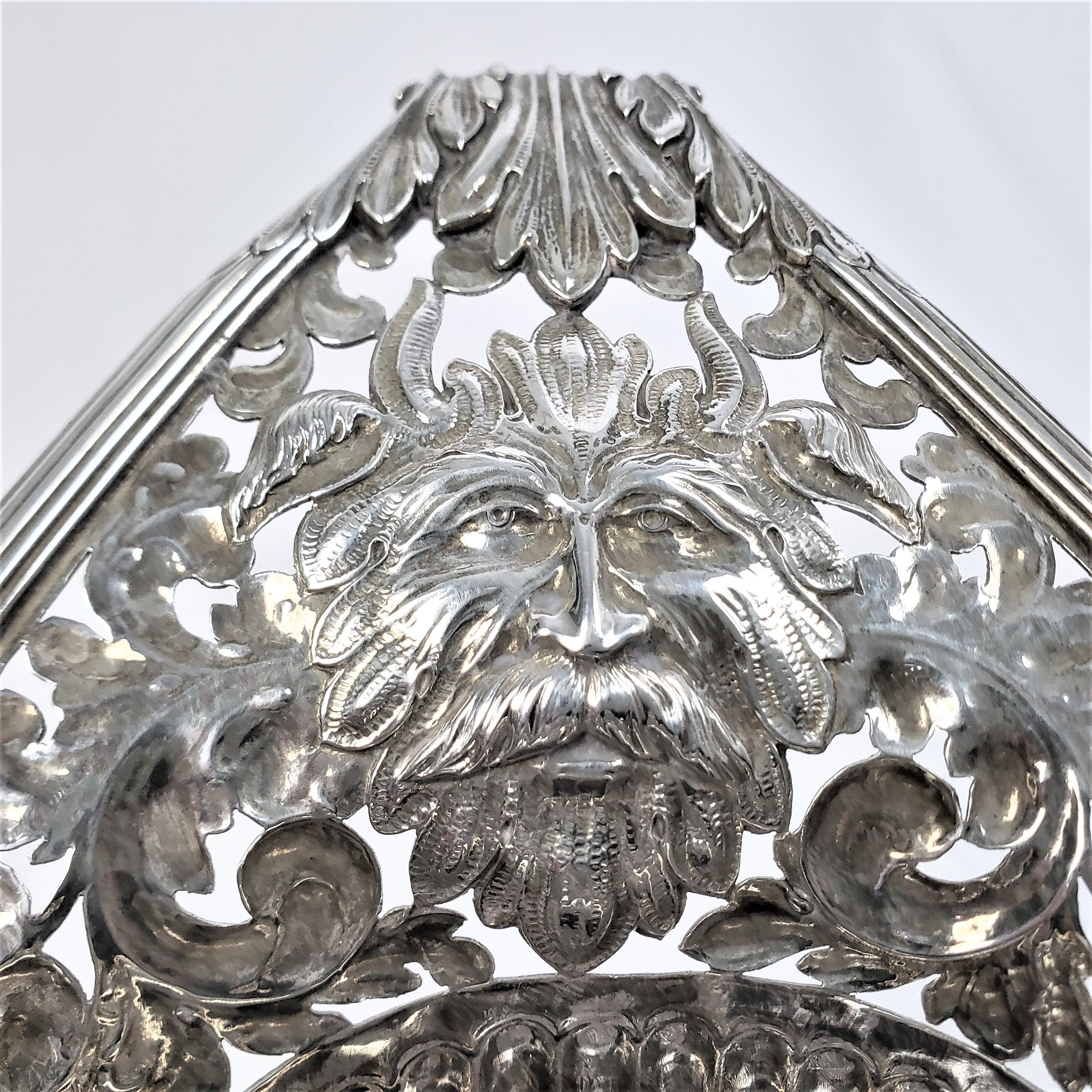 Large Sterling Silver Georgian Pierced Basket with Repousse Faces & Floral Decor For Sale 7
