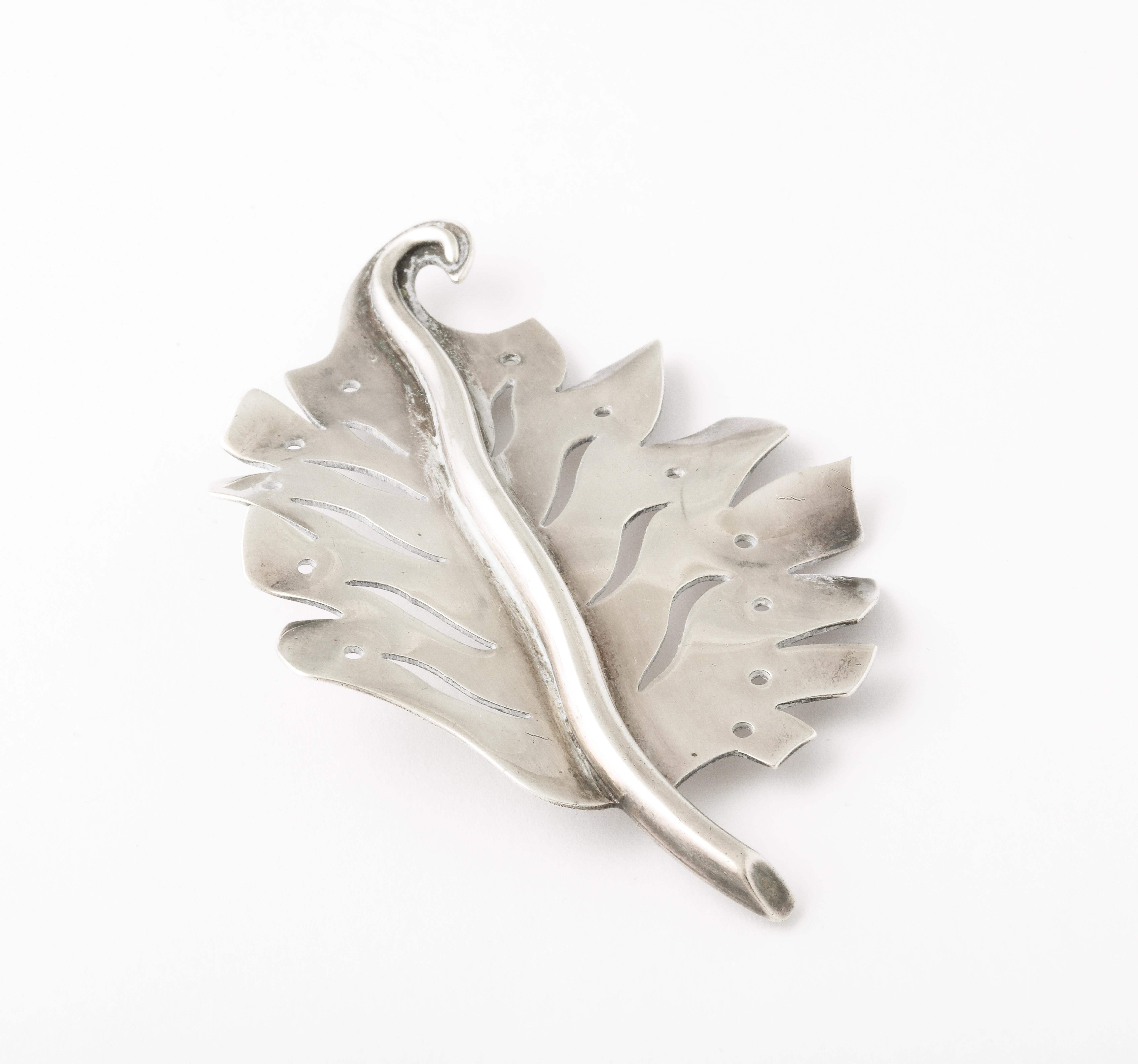 An enduring leaf that will not change color or season is made by Hector Aguilar, a master jeweler of Mexico, one of the apprentices of William Sprawling. He was manager of the Spratling studio by age 30. Aquilar worked in pure silver rather than